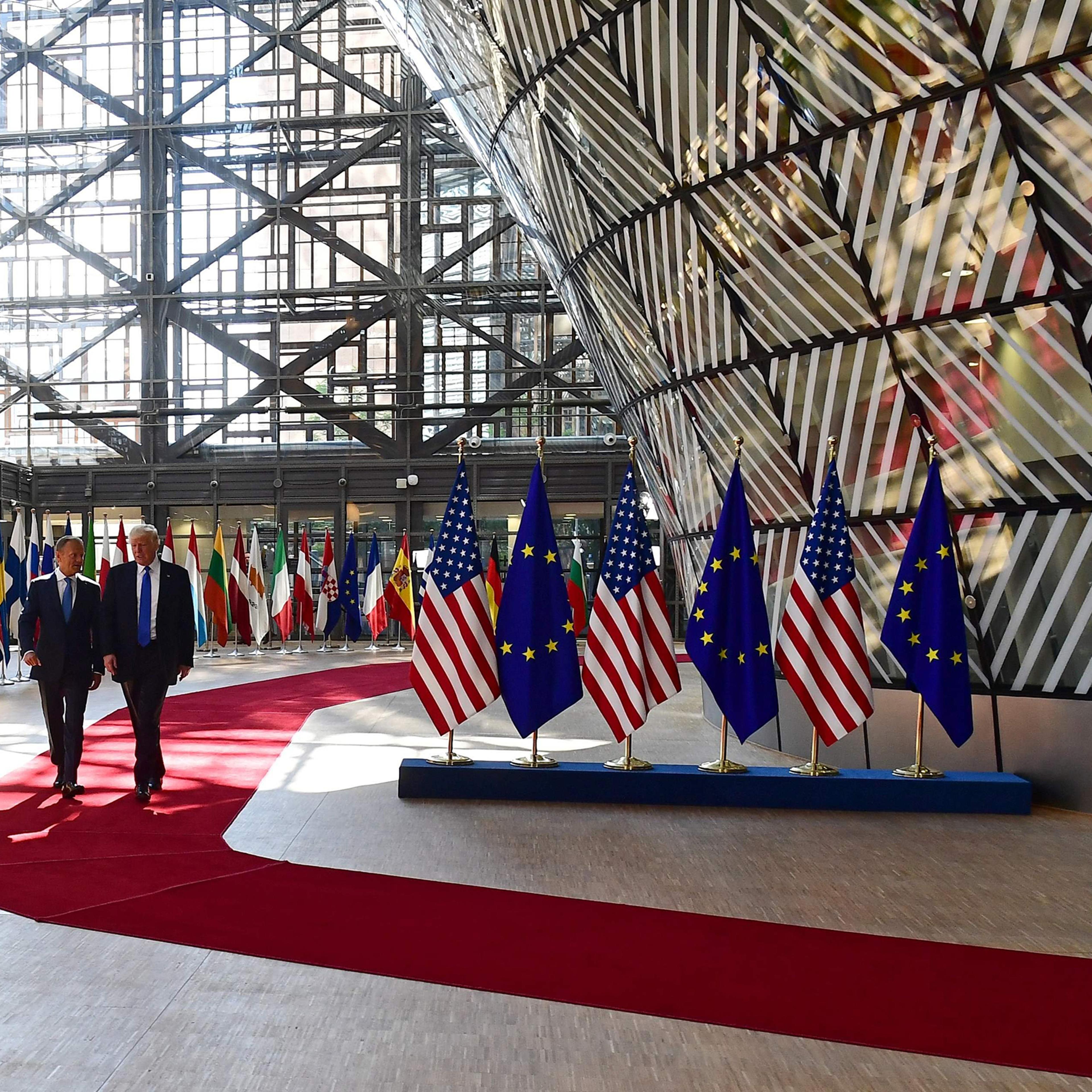 European Council President Donald Tusk speaks to President Trump after welcoming him at the E.U. headquarters, as part of the NATO meeting, in Brussels on May 25, 2017.