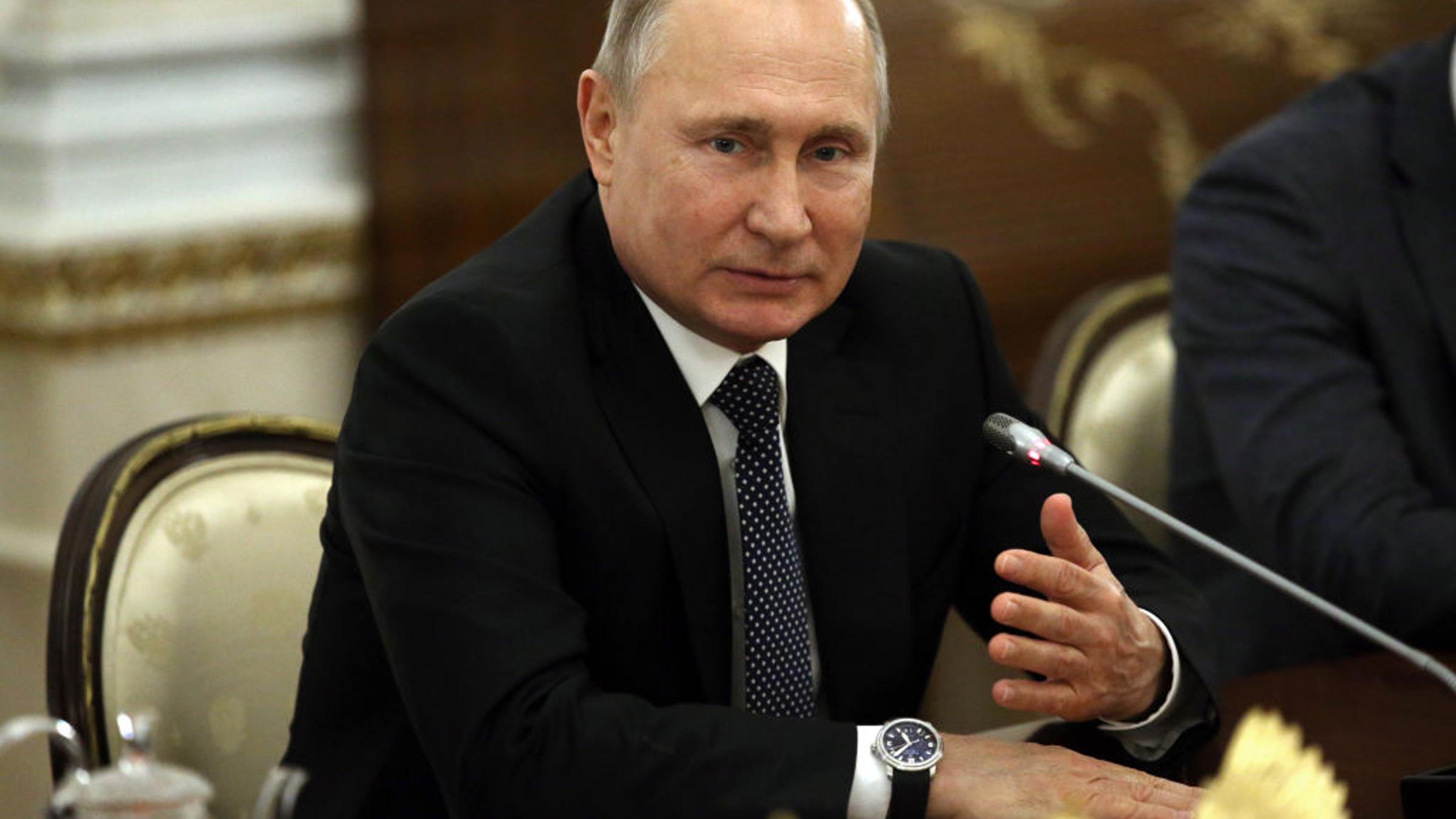 Russian President Vladimir Putin talks during his informal meeting with the 'Leaders of Russia' contest winners at the Kremlin