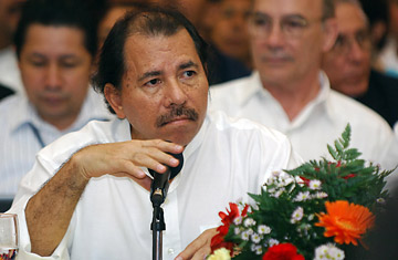 Nicaragua's President Daniel Ortega delivers a speech during the opening session of the Summit of the Central and South American countries to discuss agricultural programs to avoid food shortages in their respective countries.