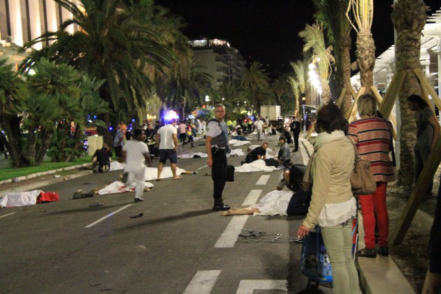 Wounded and dead bodies lie on the ground in Nice, France, July 14, after a truck crashed into a crowd on the Promenade des Anglais. 