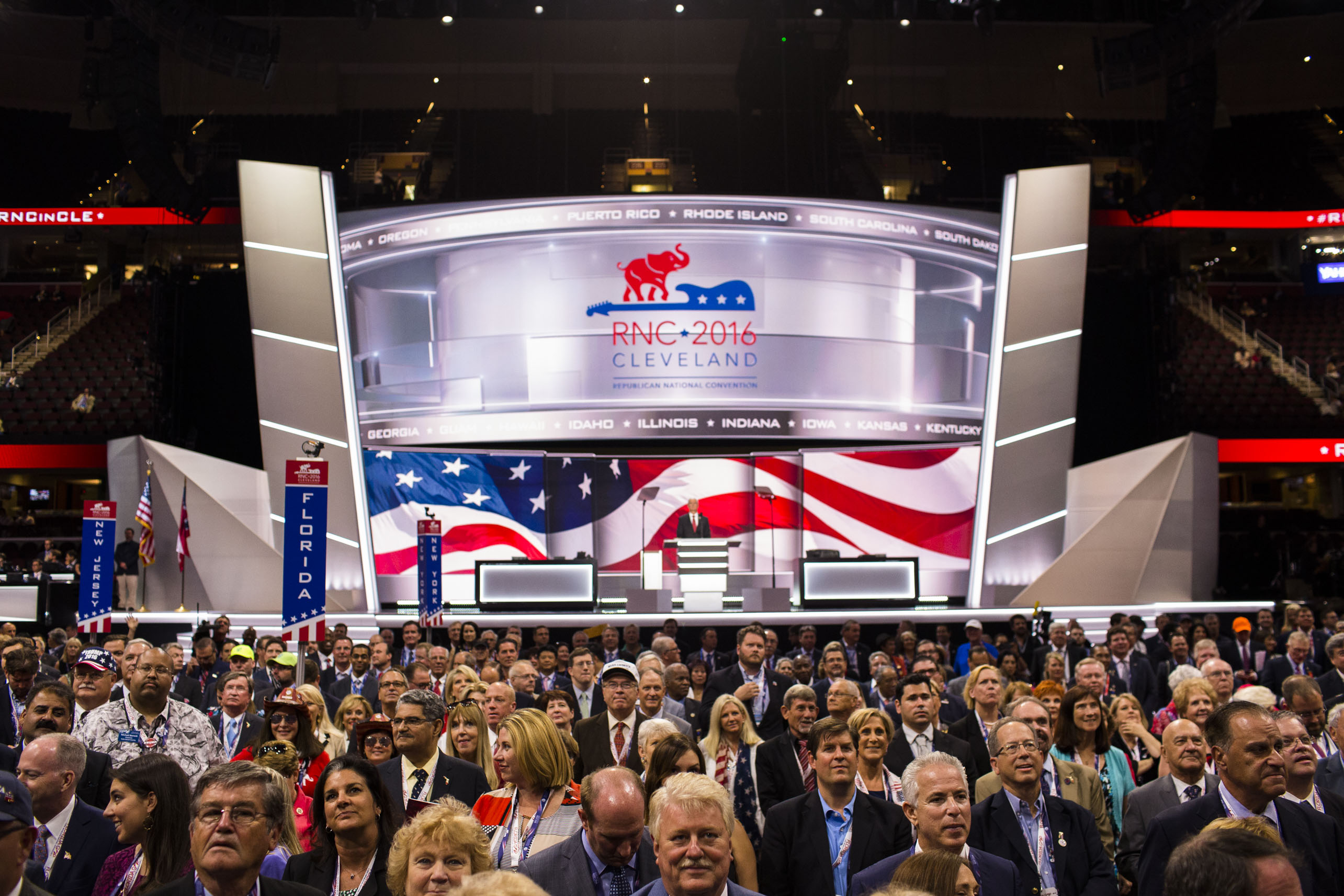 People pose for a group photo at the 2016 Republican National Convention on Monday, July 18, 2016, in Cleveland,