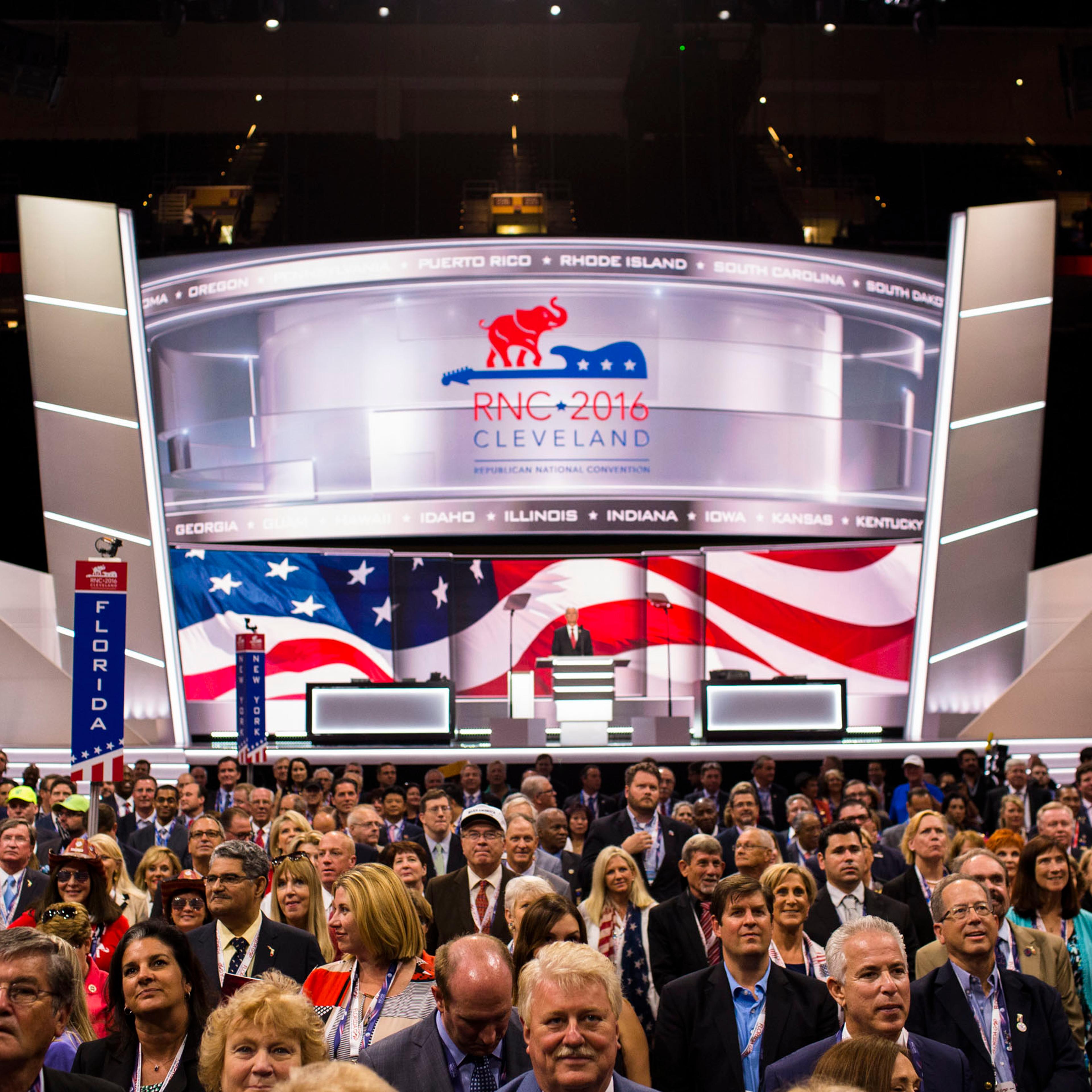 People pose for a group photo at the 2016 Republican National Convention on Monday, July 18, 2016, in Cleveland,