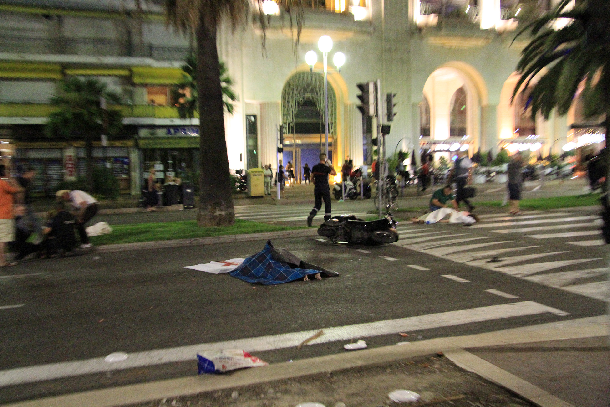 Bodies lie in the streets of Nice, France, after a terrorist attack that left at least 77 dead and dozens injured on July 14, 2016.