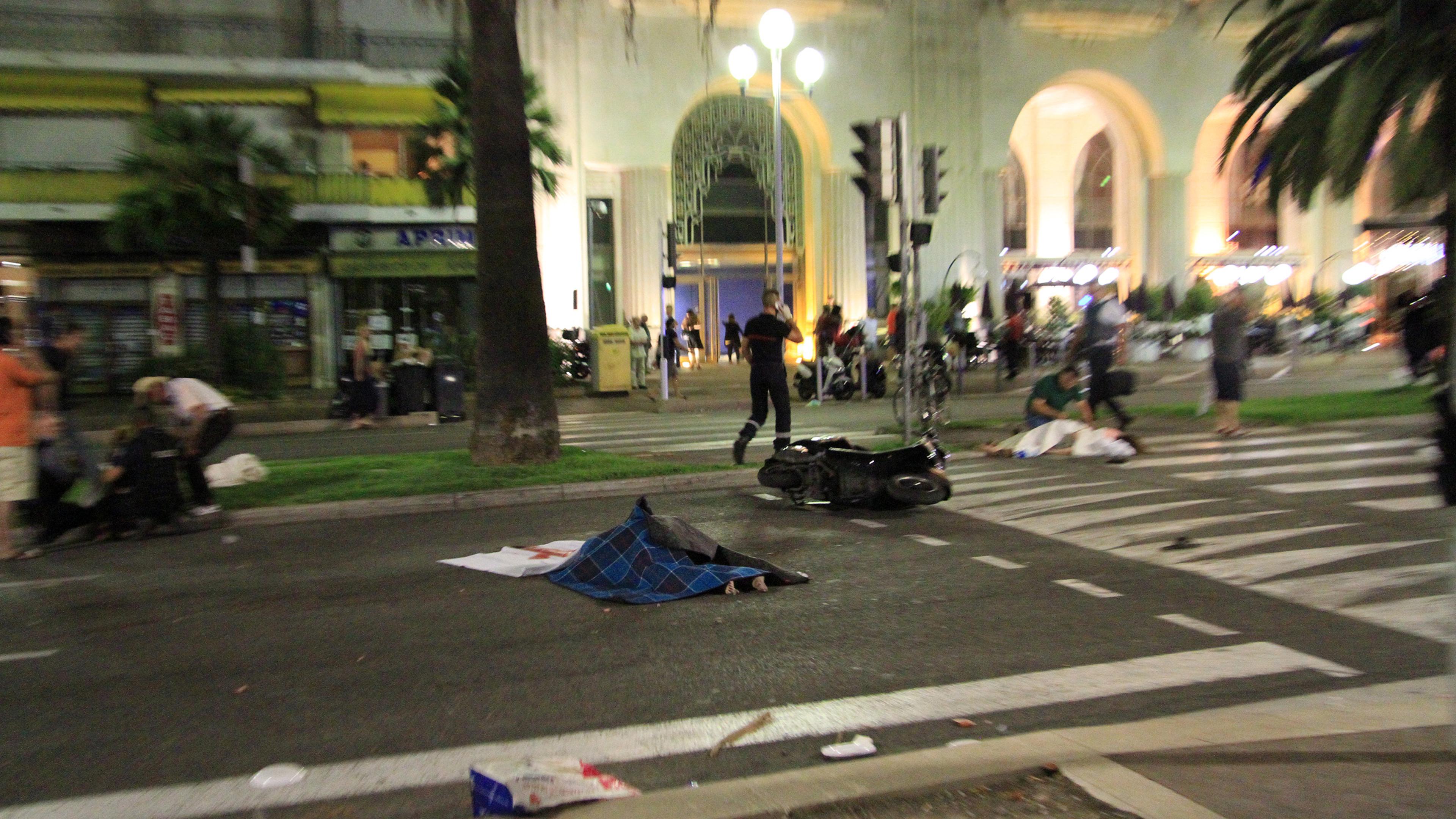 Bodies lie in the streets of Nice, France, after a terrorist attack that left at least 77 dead and dozens injured on July 14, 2016.
