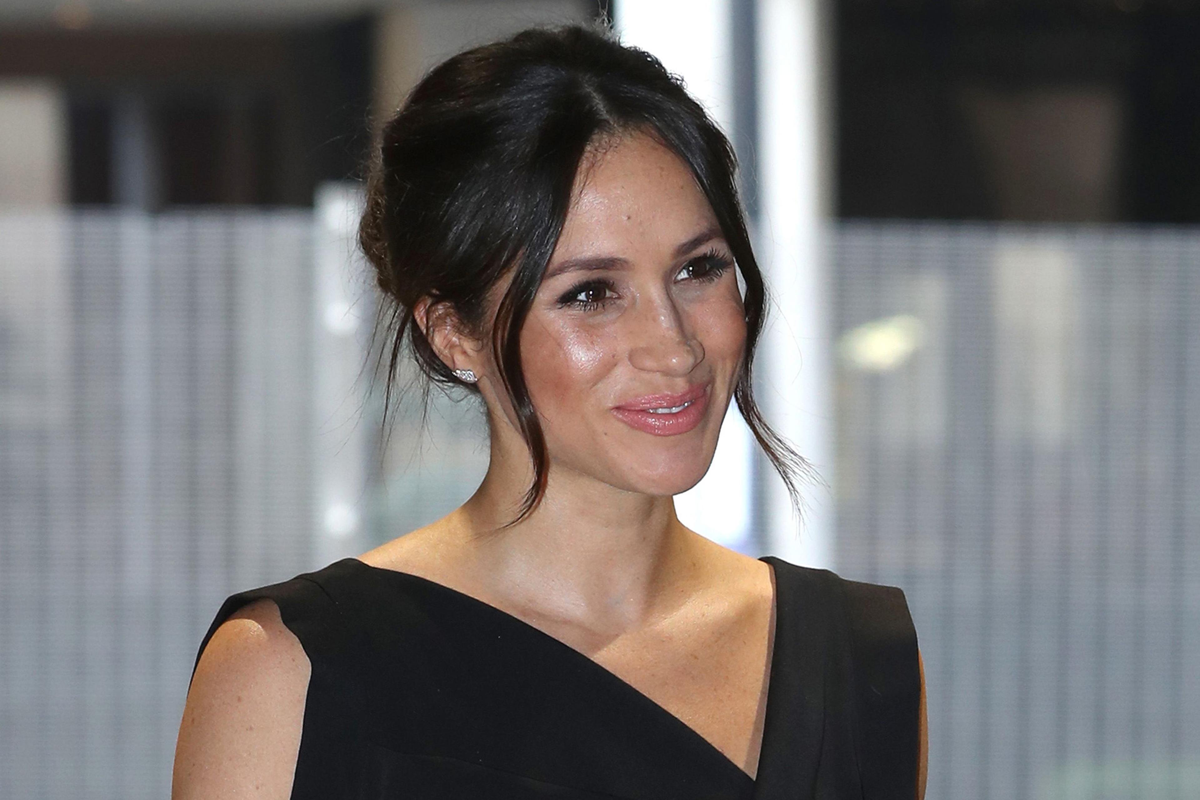 Meghan Markle Wears Celeb Favorite Black Halo Jackie O Dress Meghan Markle Wears Celeb Favorite Black Halo Jackie O Dress