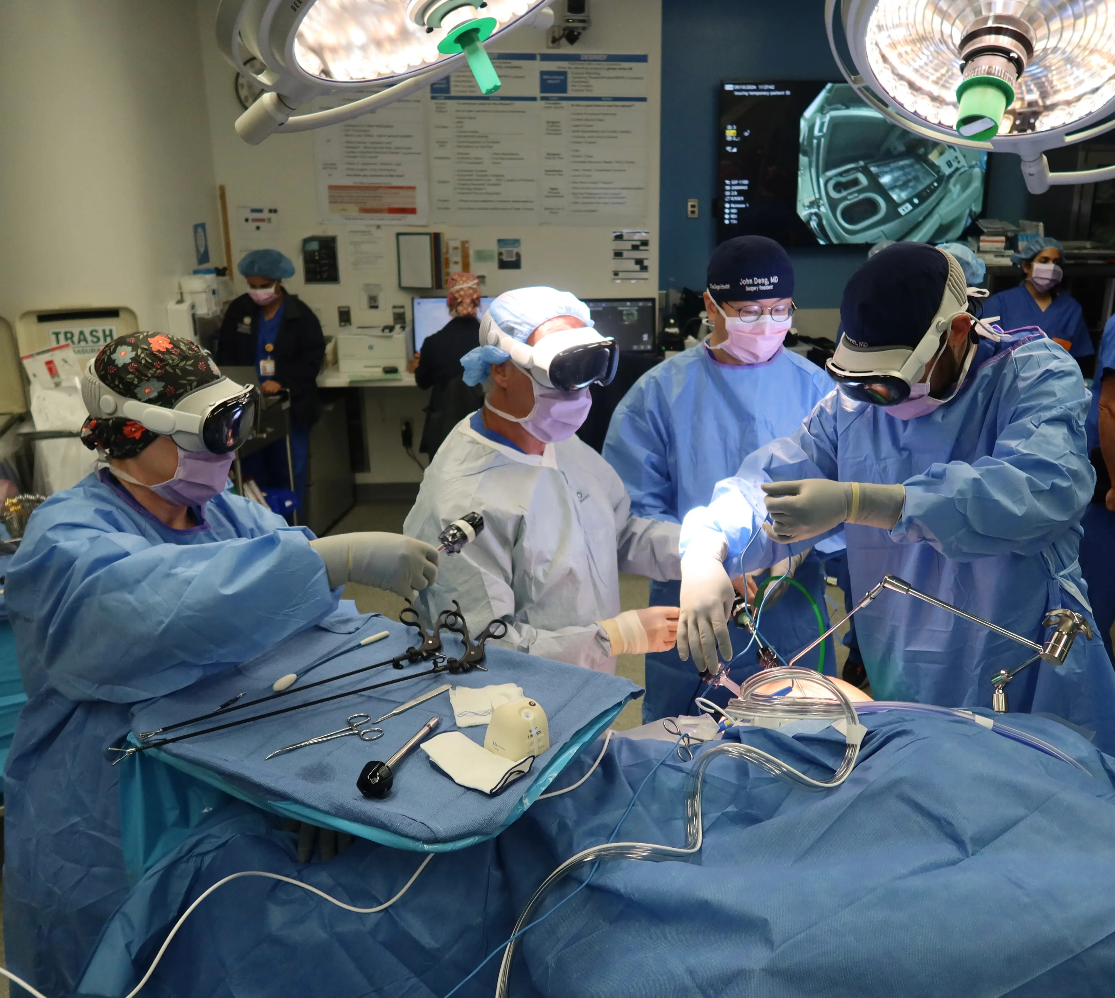 Surgeons and nurses wear Apple Vision Pro headsets instead of looking at monitors during surgery at UC San Diego Health.
