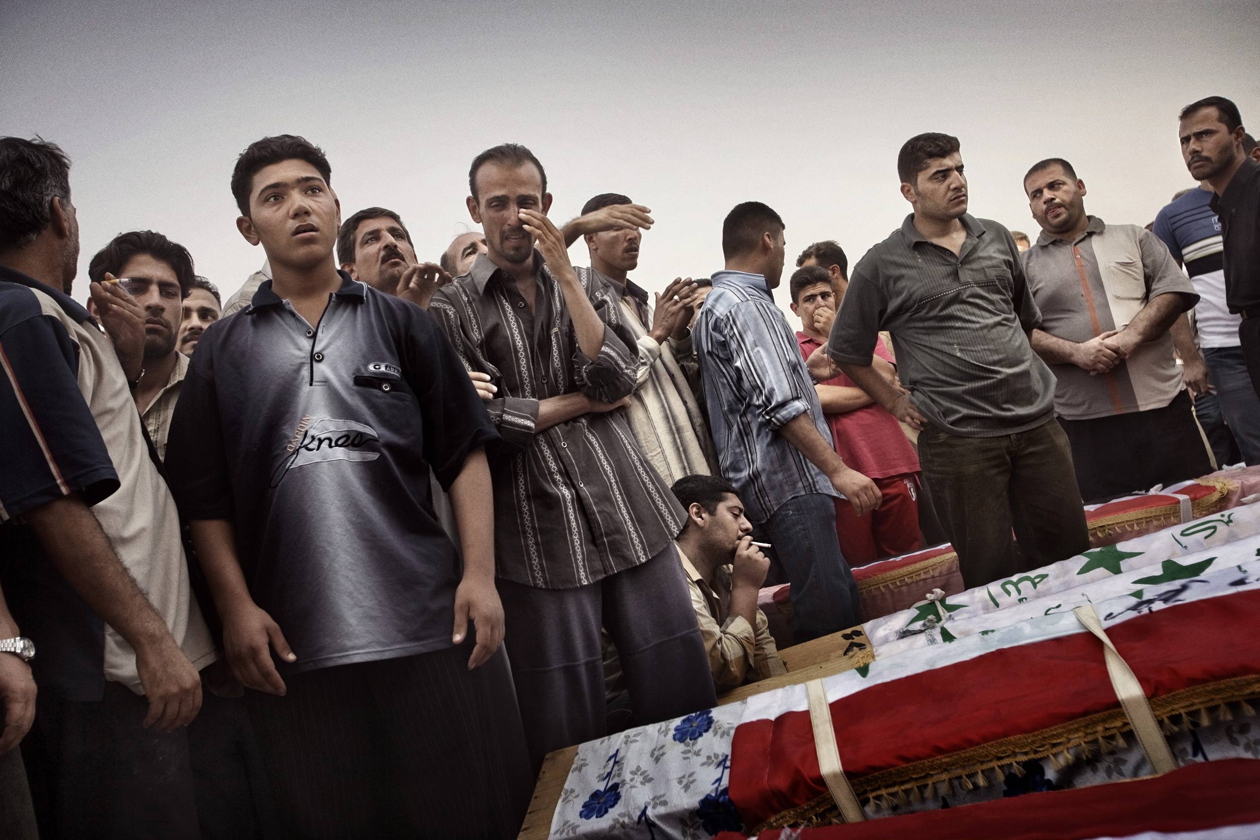 A funeral on Oct 7, 2005, in Baghdad, Iraq, for 22 men who were found handcuffed and shot dead in eastern Iraq. According to family members, the men, mostly Sunni, were taken from their homes by the special forces of the interior ministry, an almost excl