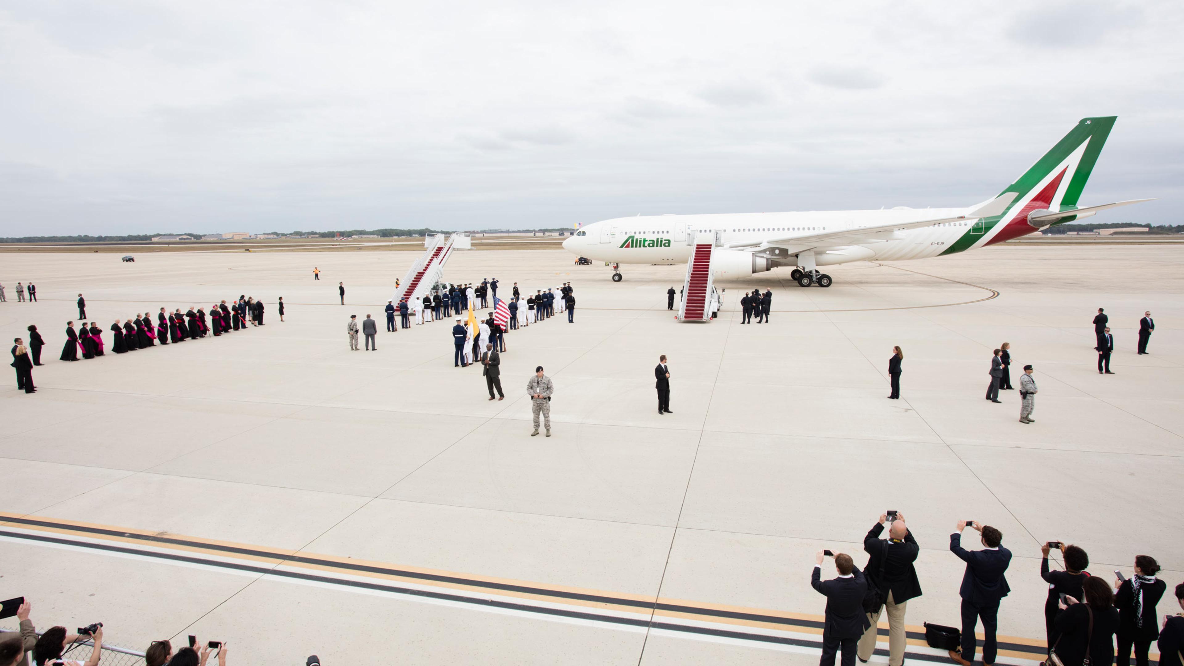 Members of the secret service, clergy, media, government and military personnel, and President Obama and his family , during the arrival of Pope Francis to the USA at Joint Base Andrews , Md., Tuesday, Sept. 22, 2015.Photograph by Tobias Hutzler for TIME