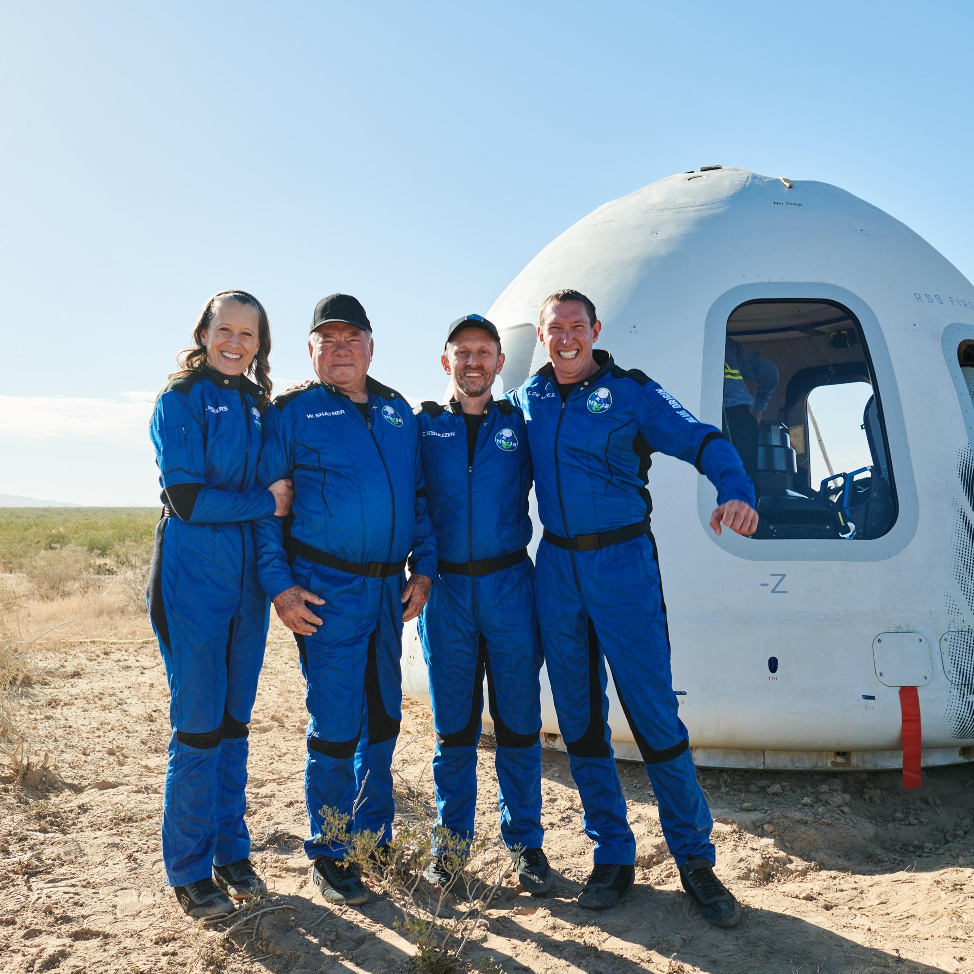 The crew of Blue Origin's NS-18, from left: Audrey Powers, William Shatner, Dr. Chris Boshuizen, and Glen de Vries), after the capsule landed near Van Horn, Tex. on Oct. 13, 2021