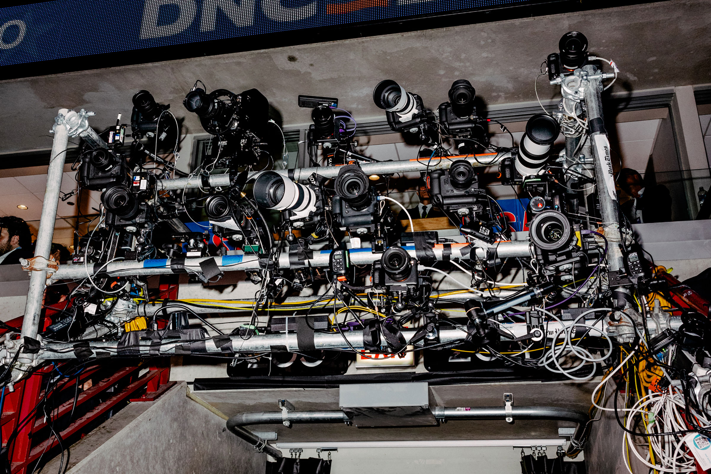 Day 3: Remote cameras belonging to photographers from different publications seen inside the arena, Aug. 21