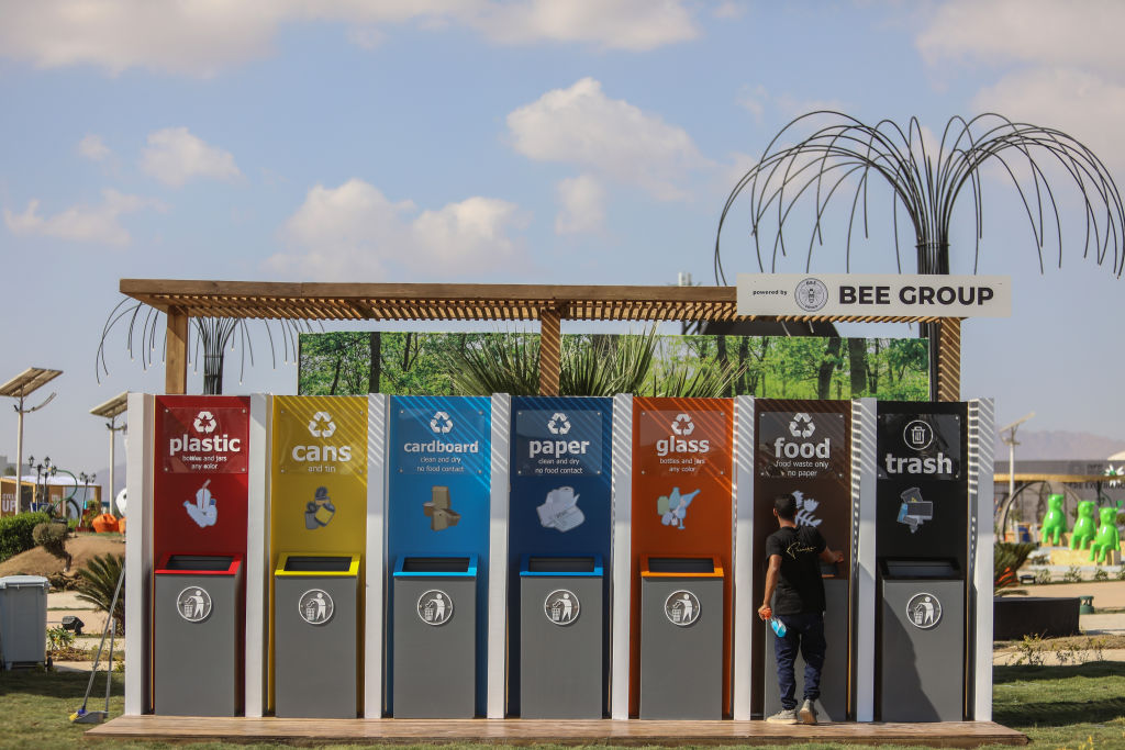 Seven different types of trash bins—including plastic cans, food and general trash—at the 2022 UN climate conference