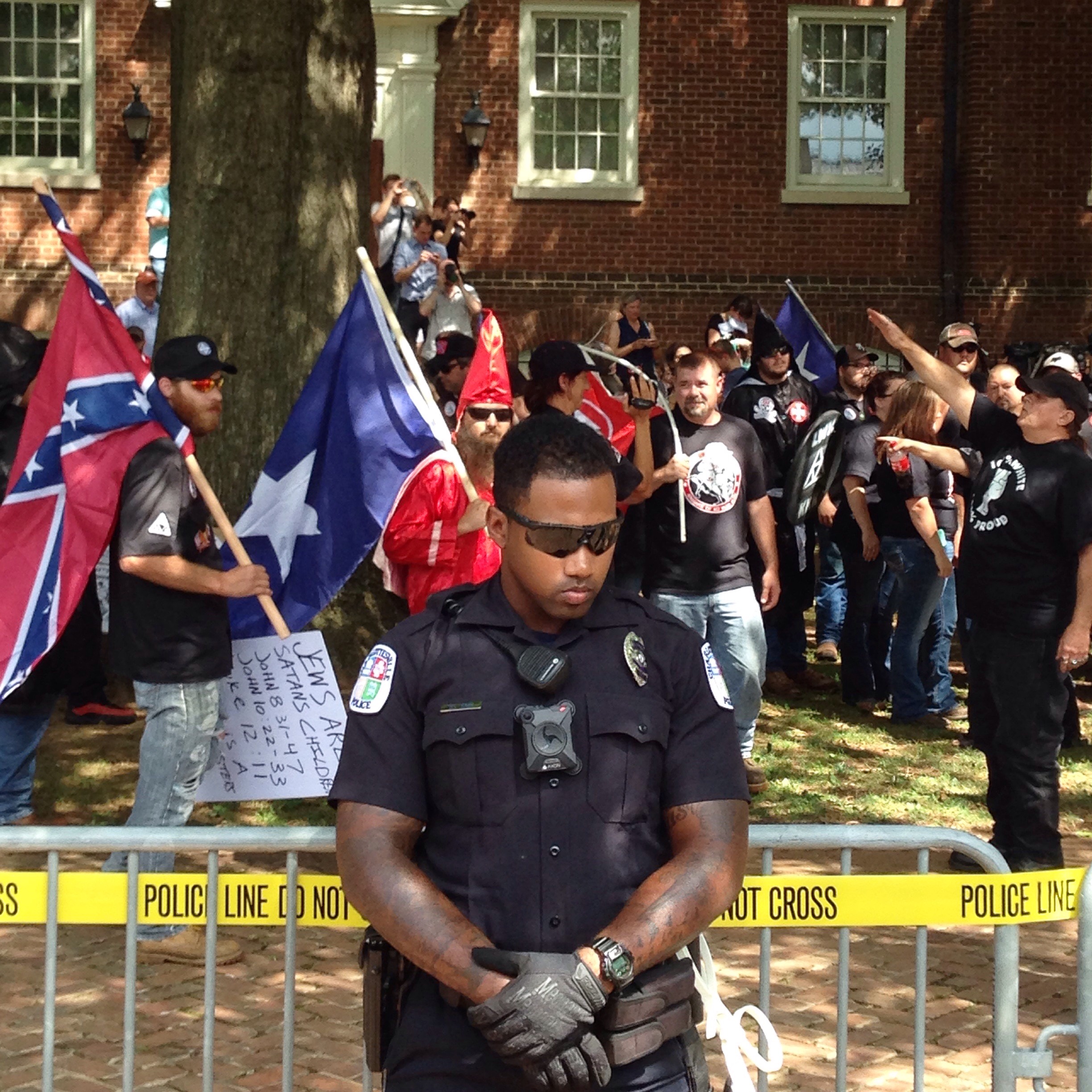Charlottesville Protest: Cop in Viral Photo of KKK Speaks