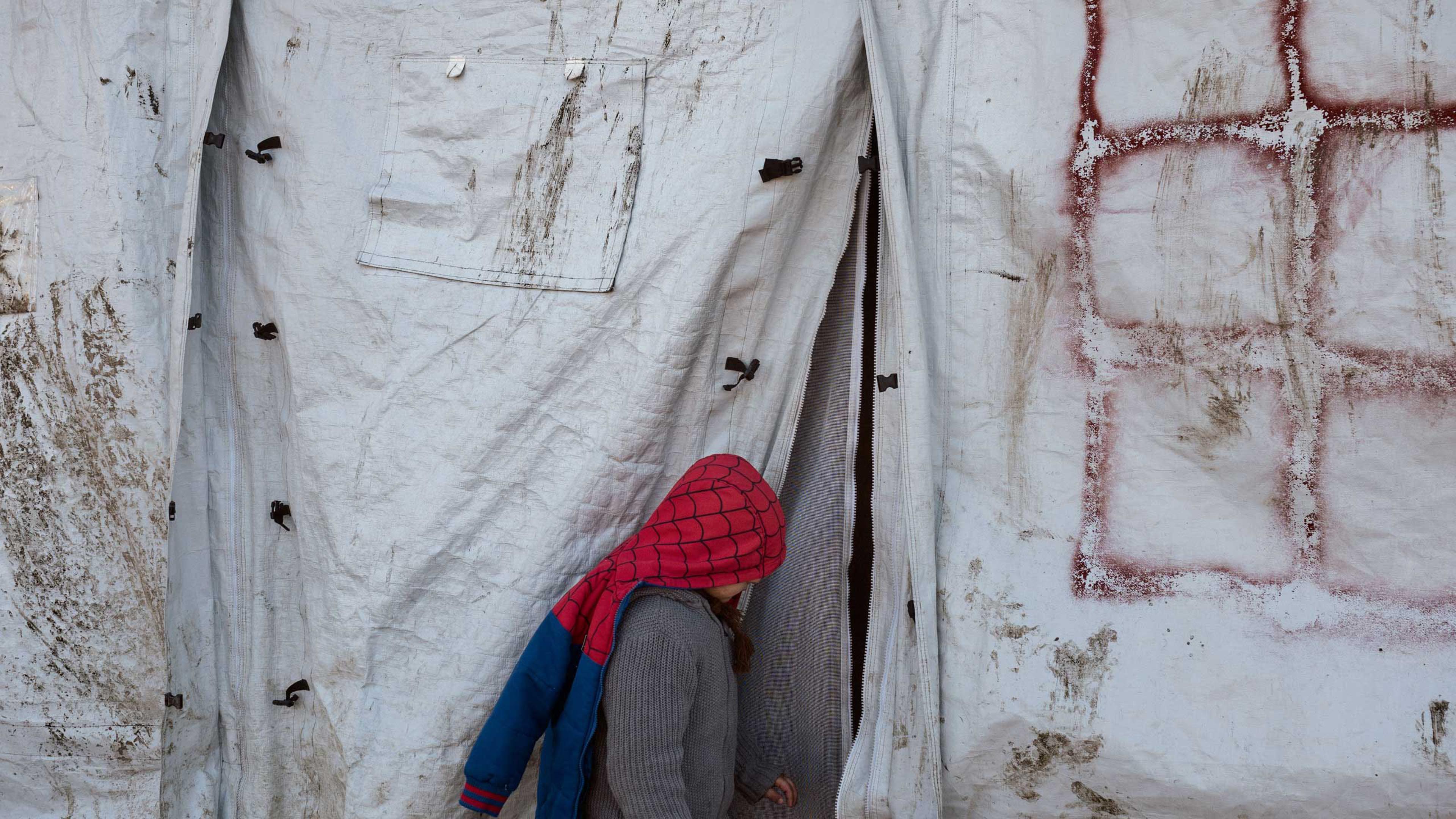 A boy wears a spider man jacket at the refugee camp in Grande-Synthe, near Dunkirk, France, which is accommodating over 2,500 refugees mostly families from Kurdistan, Jan. 19, 2016.