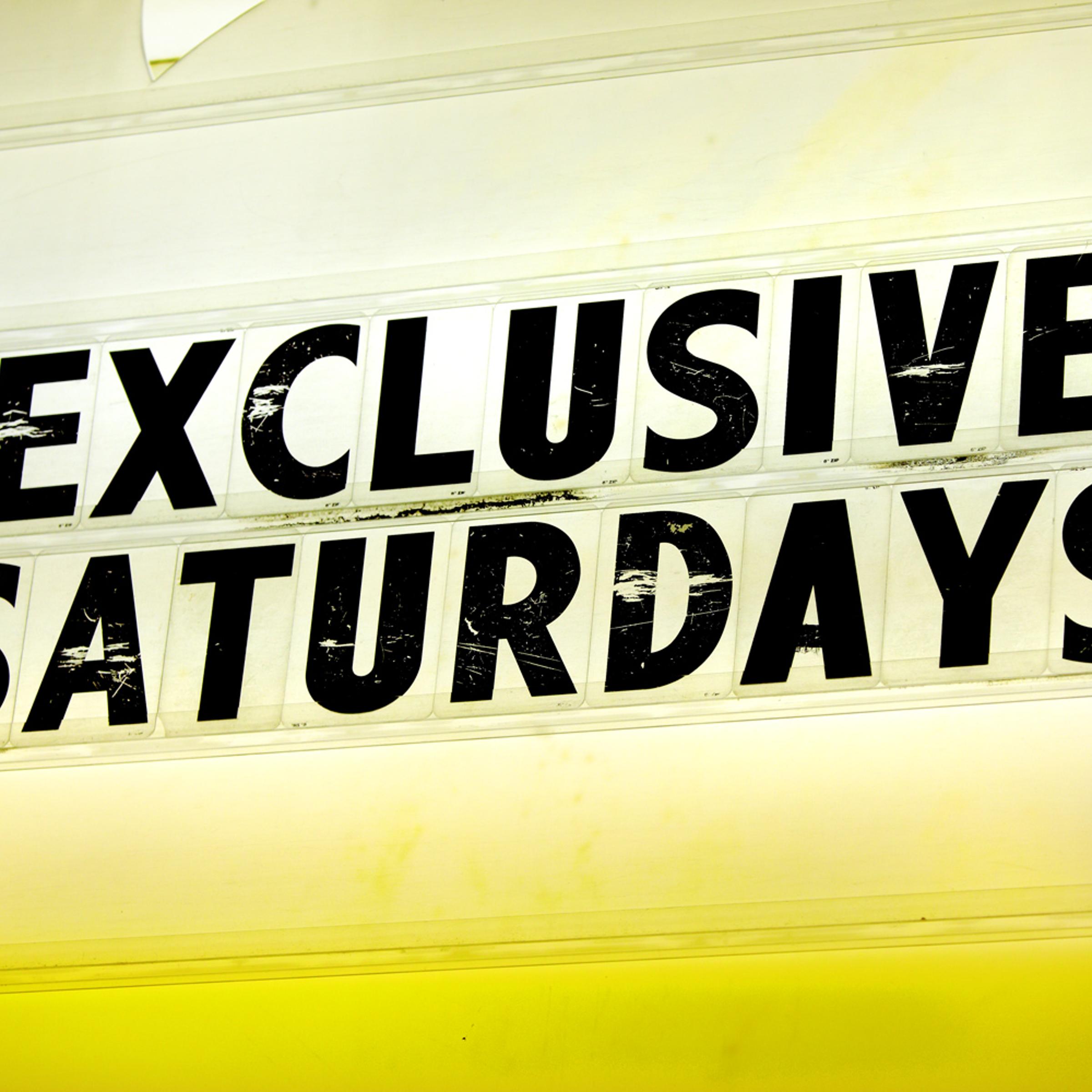 A sign outside of a club reads: Exclusive Saturdays, Two Dollar Tuesdays, Magic City Mondays, Bitch Slap Thursdays, Thirsty Thursdays, Pin Up Sundays.