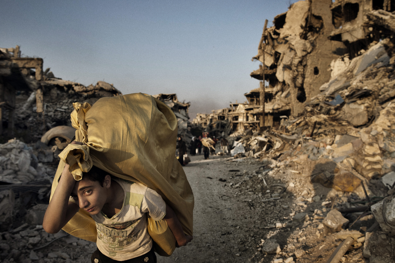 Once filled with cafés and shops, the Qabaris neighborhood in the Old City area of Homs has been reduced to rubble. May 12, 2014.