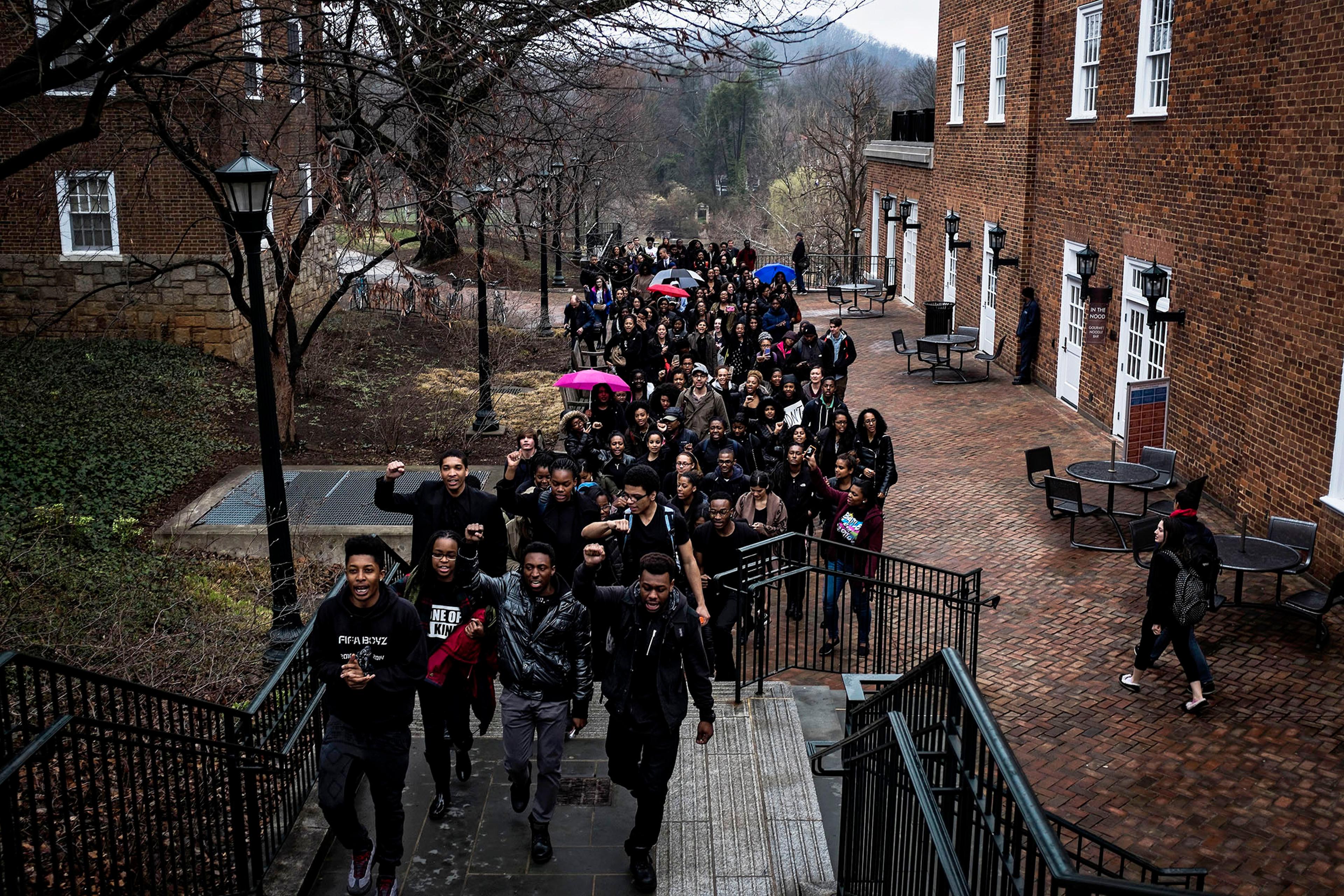 Students protest at the University of Virginia following the Tuesday night arrest by ABC police of student Martese Johnson, 20, outside a bar in Charlottesville, Virginia