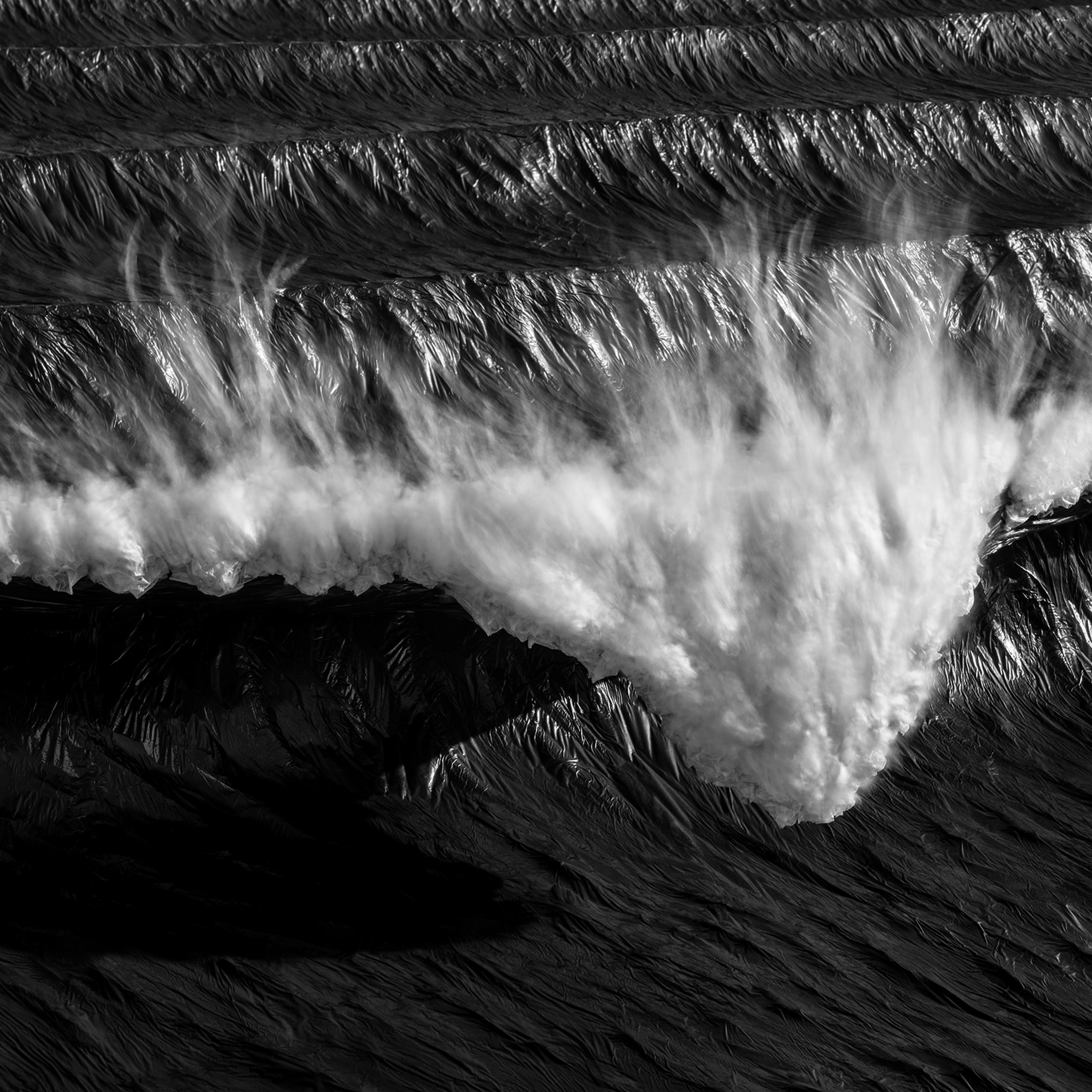 Photo of a wave sculpture crafted out of recycled materials