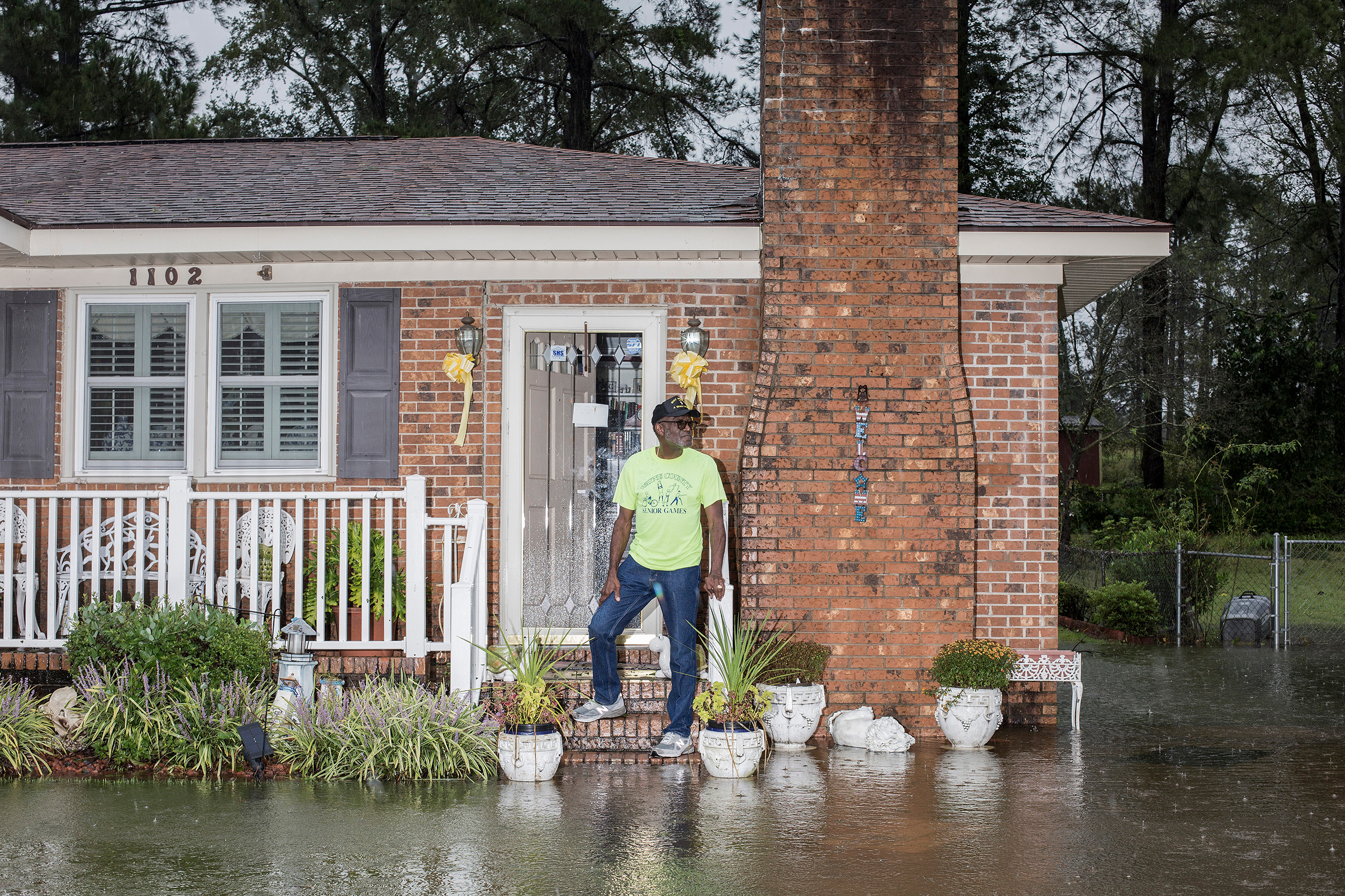 Coy Coley poses for a portrait in front of his home on Simpson St., after his neighborhood was flooded due to rainfall from Hurricane Florence in Goldsboro, N.C. on Saturday, September 15, 2018.