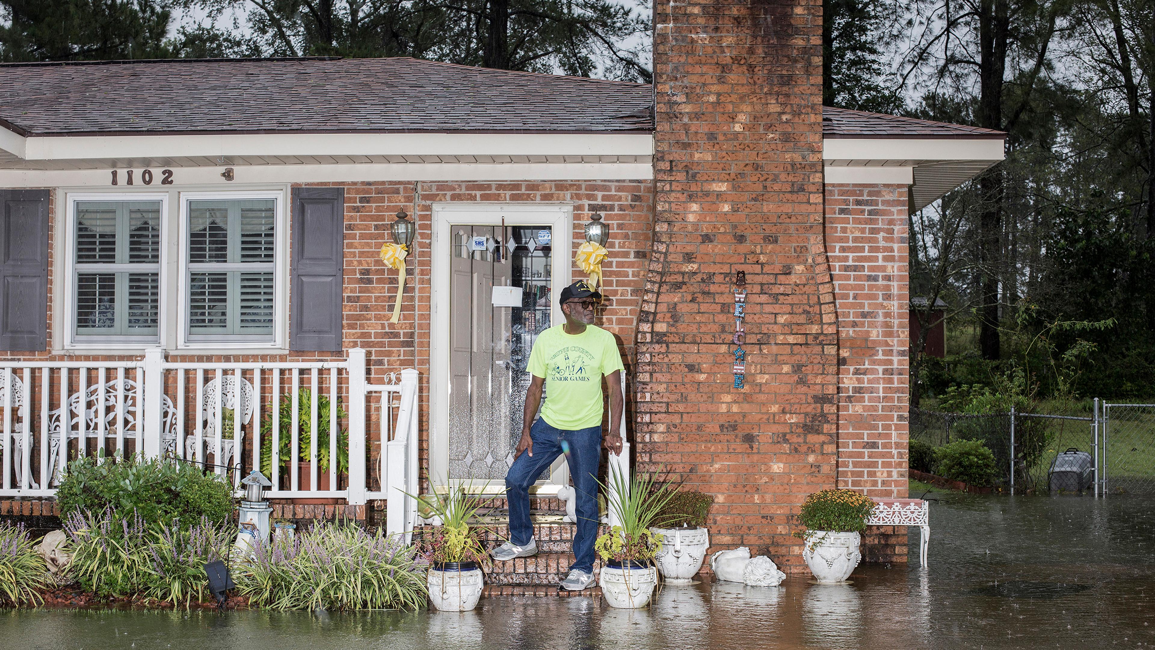 Coy Coley poses for a portrait in front of his home on Simpson St., after his neighborhood was flooded due to rainfall from Hurricane Florence in Goldsboro, N.C. on Saturday, September 15, 2018.
