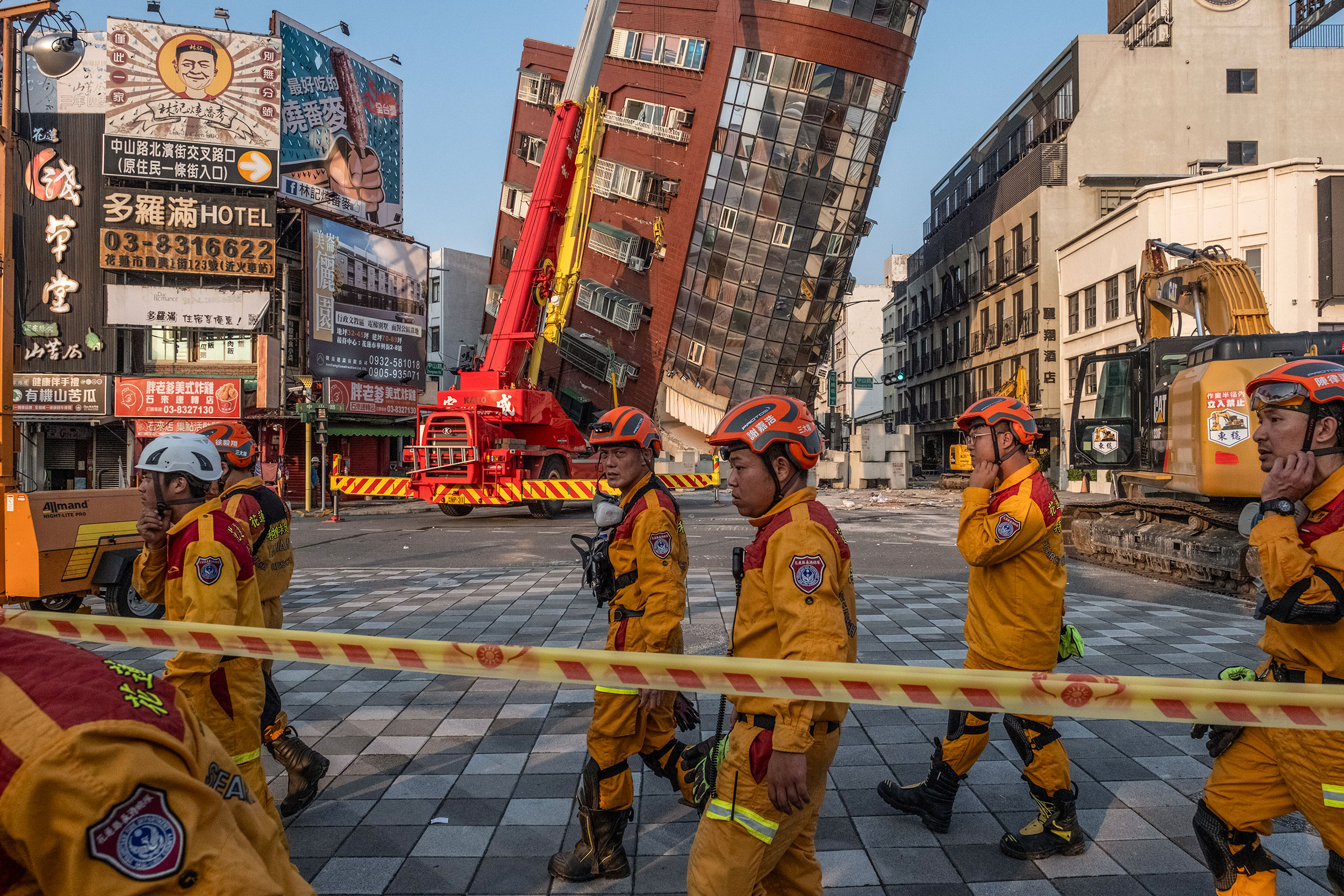 A search-and-rescue team prepares to enter a building following a magnitude-7.4 earthquake in Hualien, Taiwan