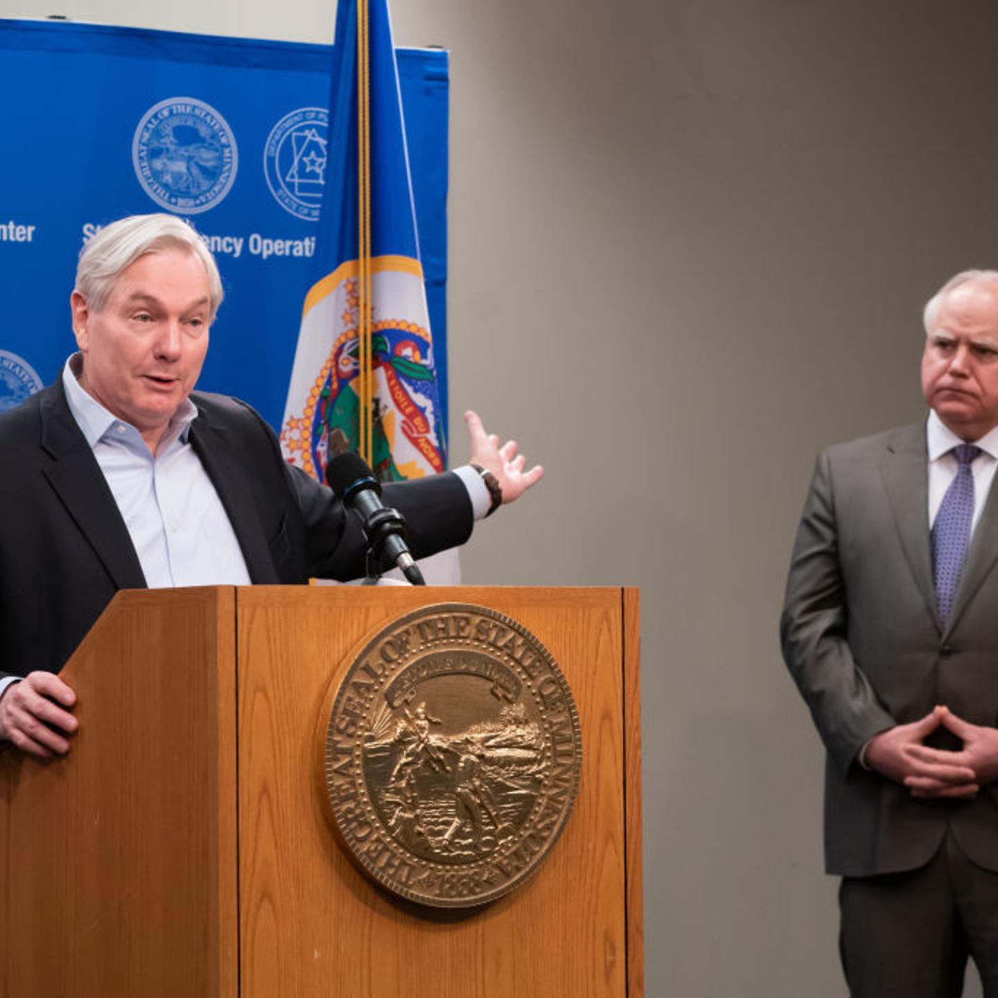 Michael Osterholm, left, and Minnesota Governor Tim Walz, right, at a briefing during the COVID-19 pandemic in 2020 in St. Paul, MN
