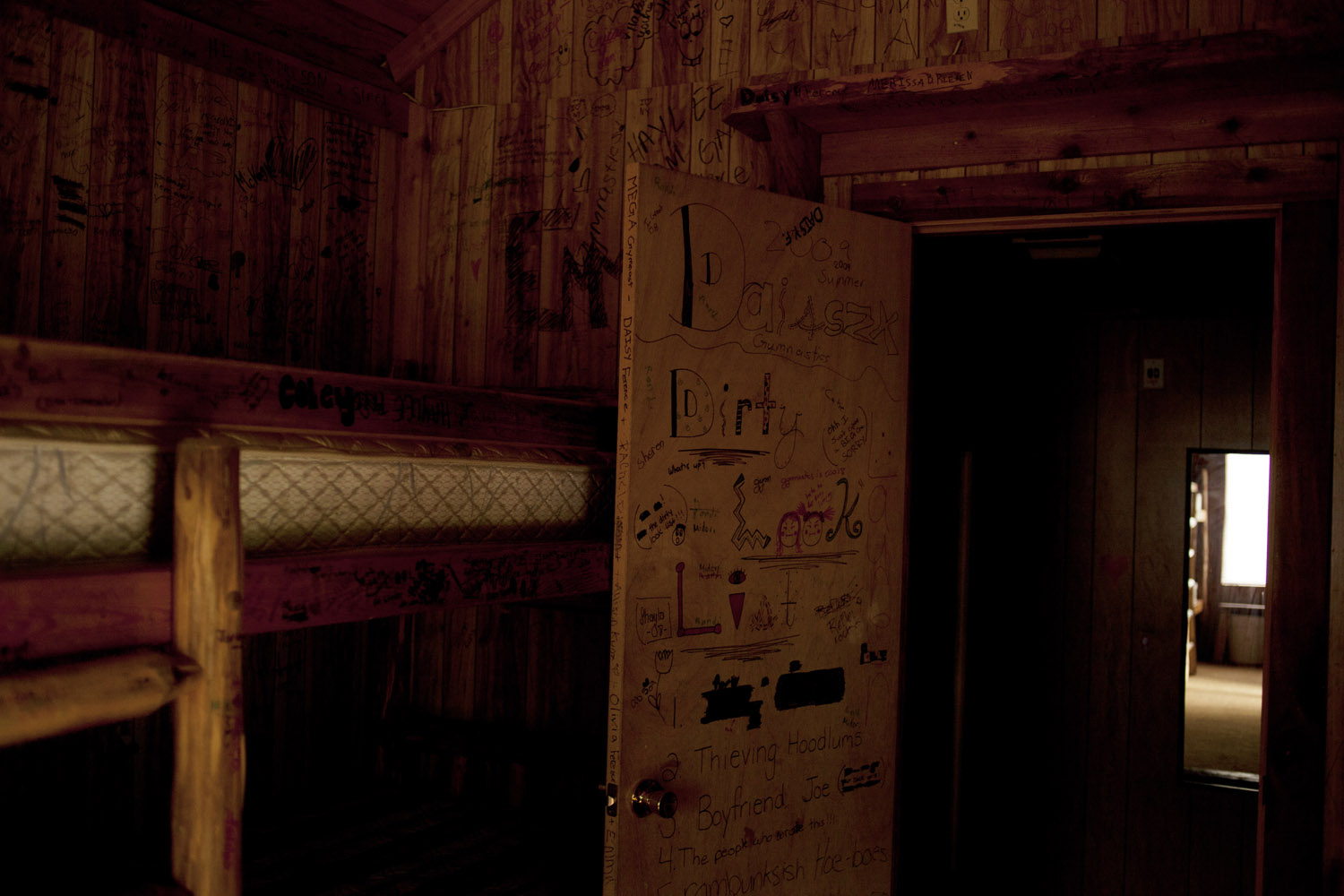 Graffiti in the cabins where young visiting gymnasts stay.