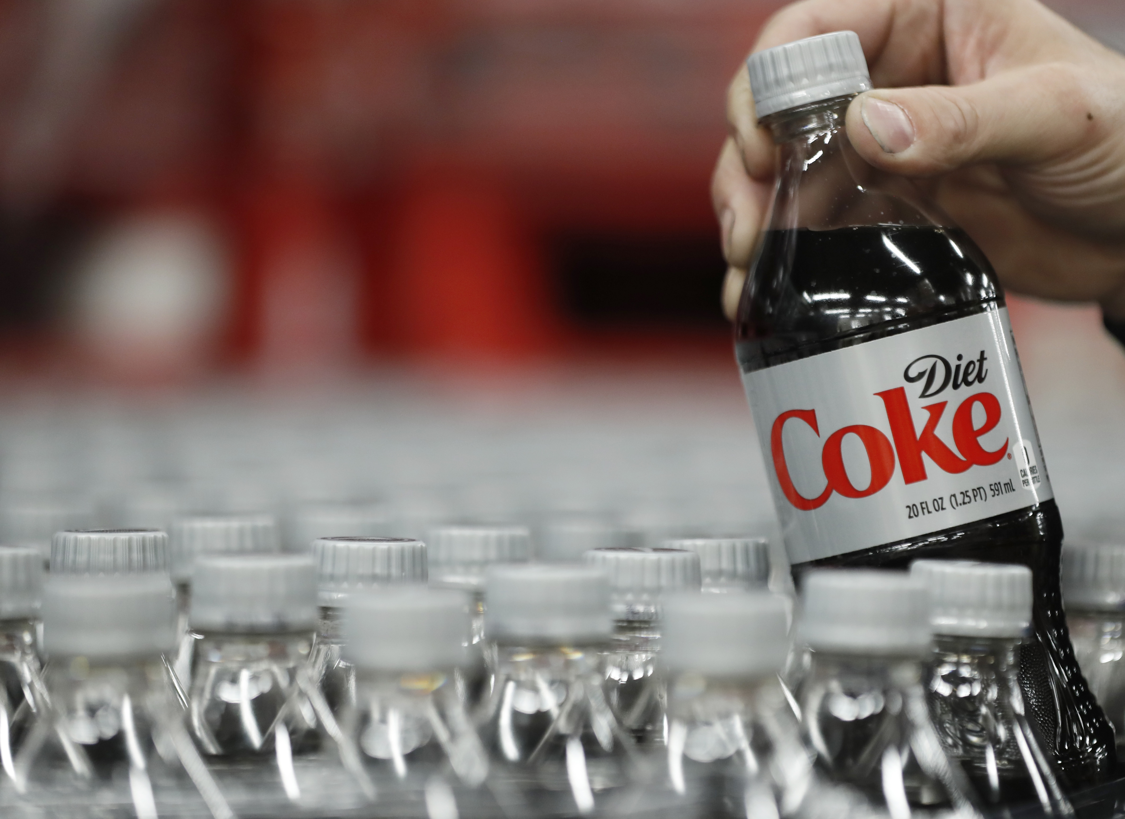 Coca-Cola Predicts Drop In Profit This Year