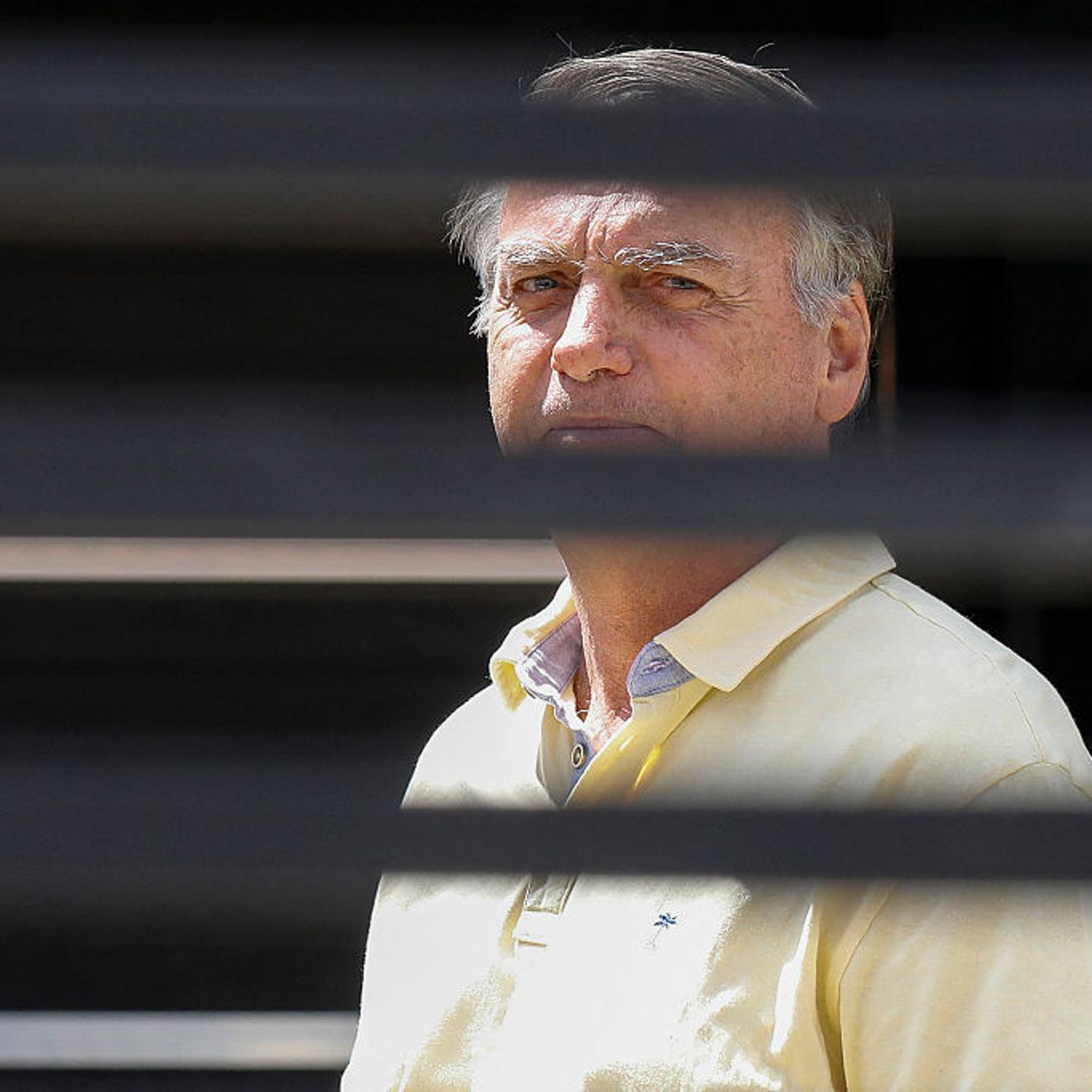 Former Brazilian President Jair Bolsonaro gestures from his residence in Brasilia, Brazil, on Sept. 3, 2025.