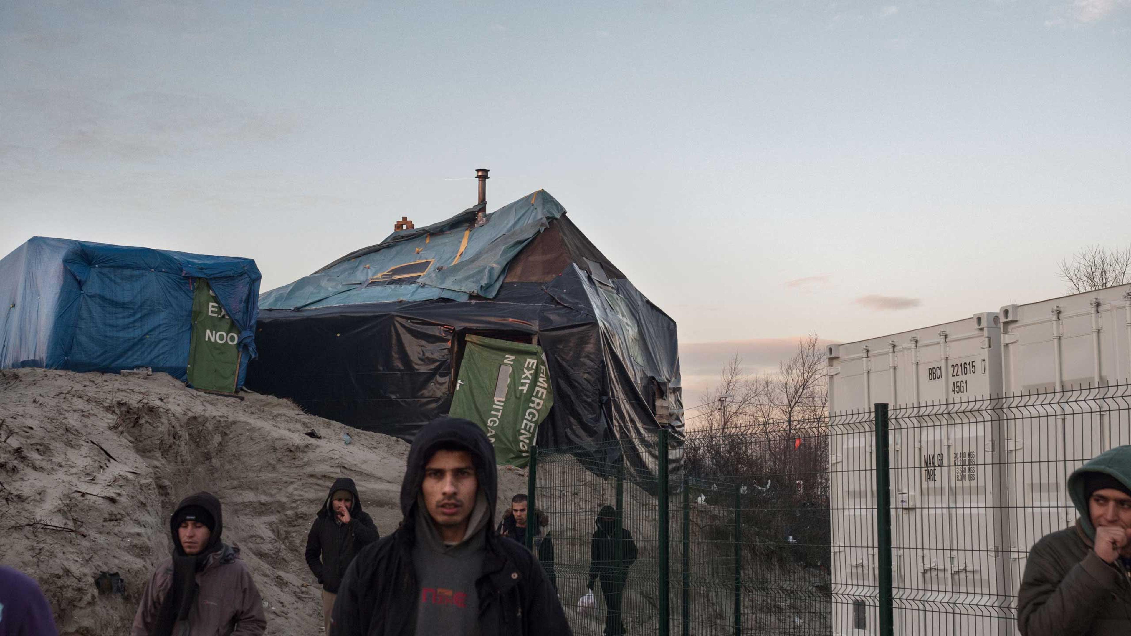 New containers for migrants are now being built that will take the place of tent dwellings in Calais, France, Jan.19, 2016.