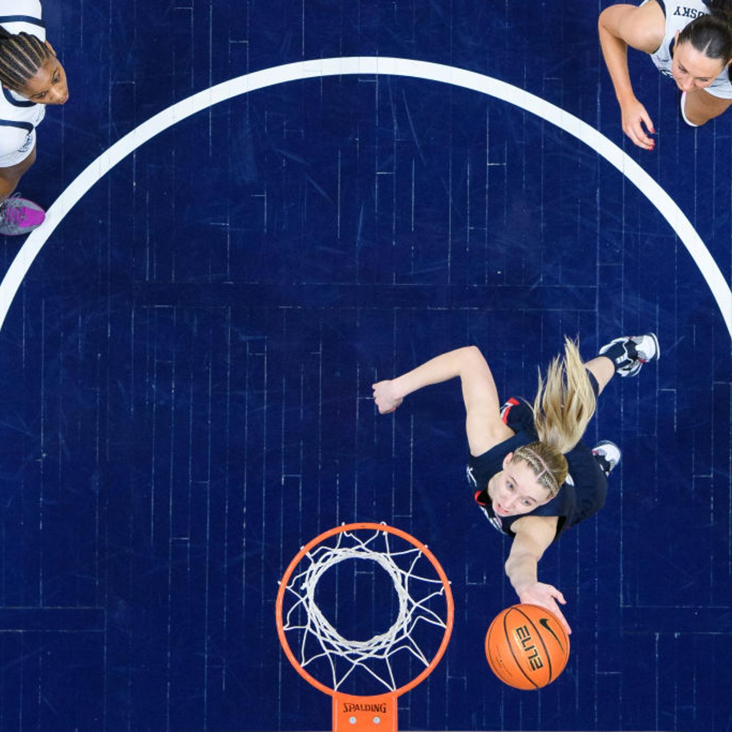 Paige Bueckers, #5 of the UConn Huskies, drives past Riley Makalusky, #2 of the Butler Bulldogs, for a layup during the women's college basketball game between the Butler Bulldogs and UConn Huskies at Hinkle Fieldhouse in Indianapolis, Ind., on Feb. 22,