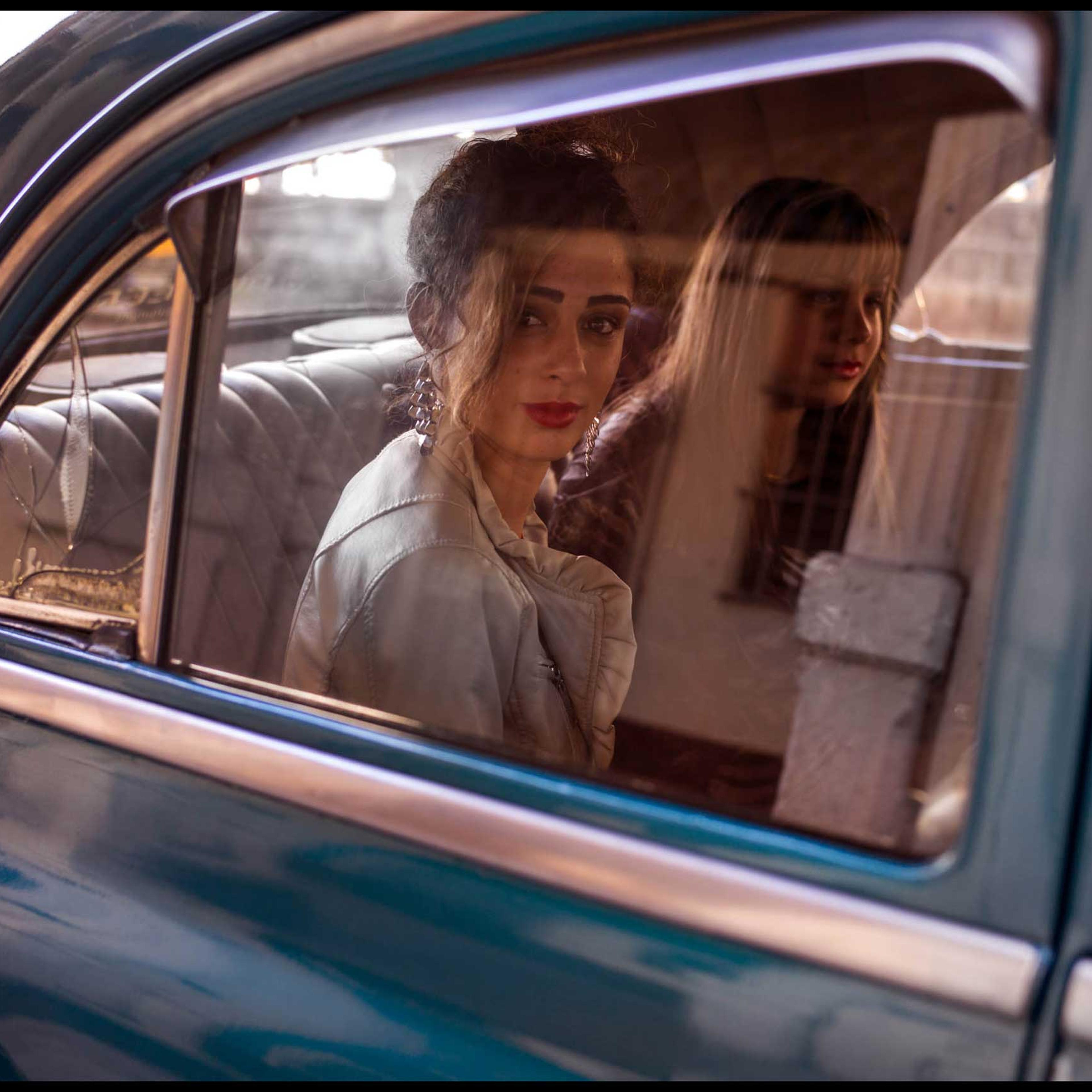 <span class="photo-essays-link"><span class="separator">・