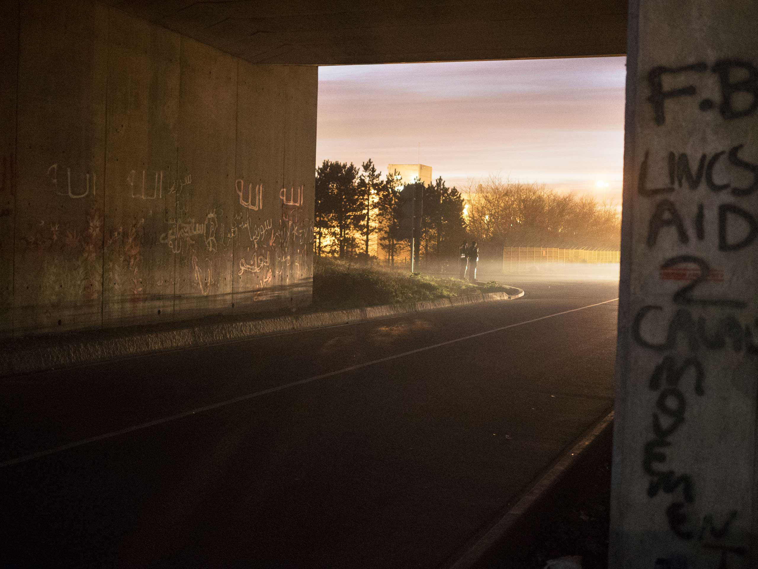 Anti-riot police stand on alert in Calais, France, where confrontations with migrants have become a frequent occurrence, Dec. 7, 2015.