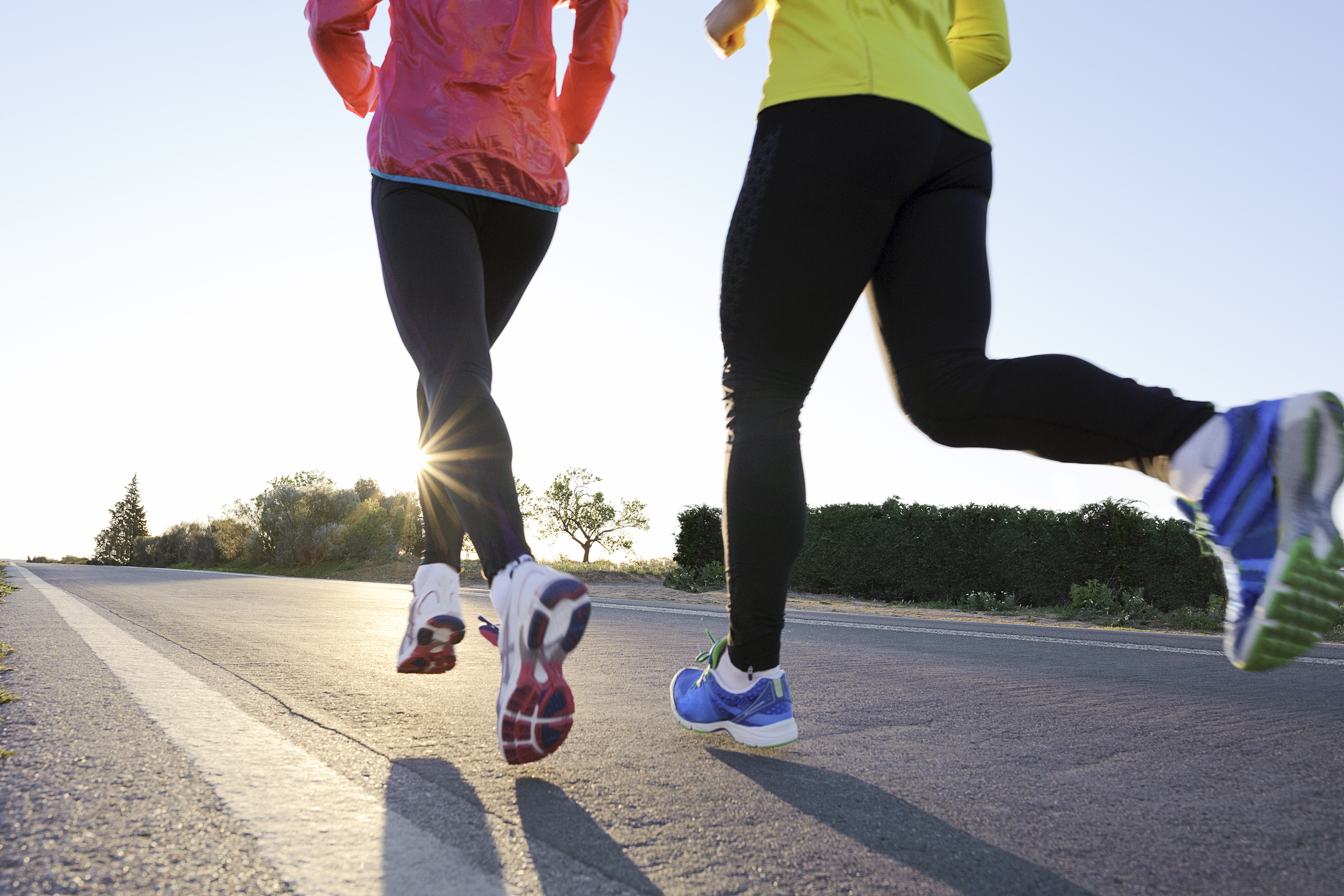 two-people-running-jogging