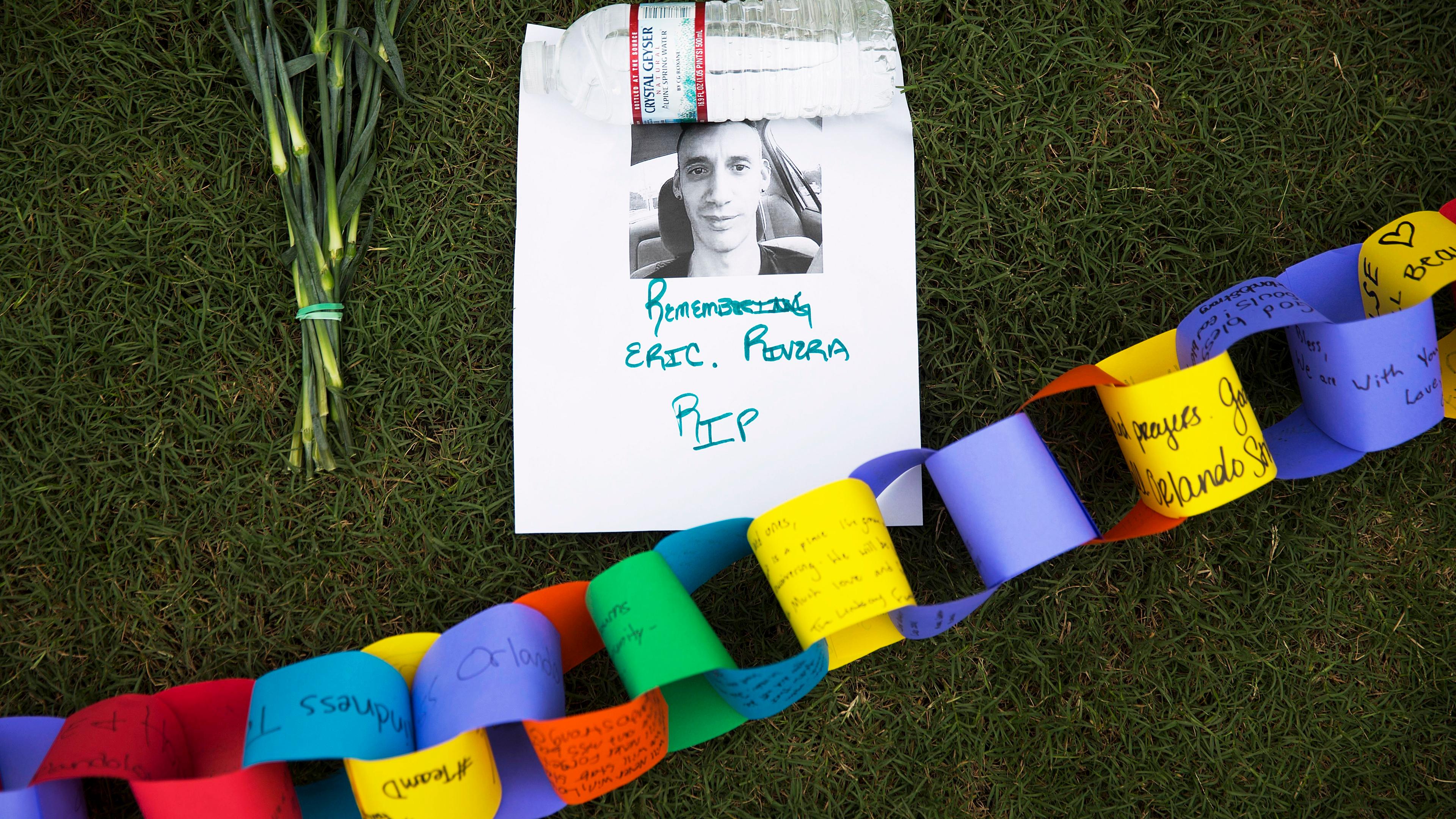A remembrance for Eric Rivera, killed in the mass shooting at the Pulse nightclub, sits amongst a makeshift memorial for the victims in Orlando, Fla., on June 13, 2016.