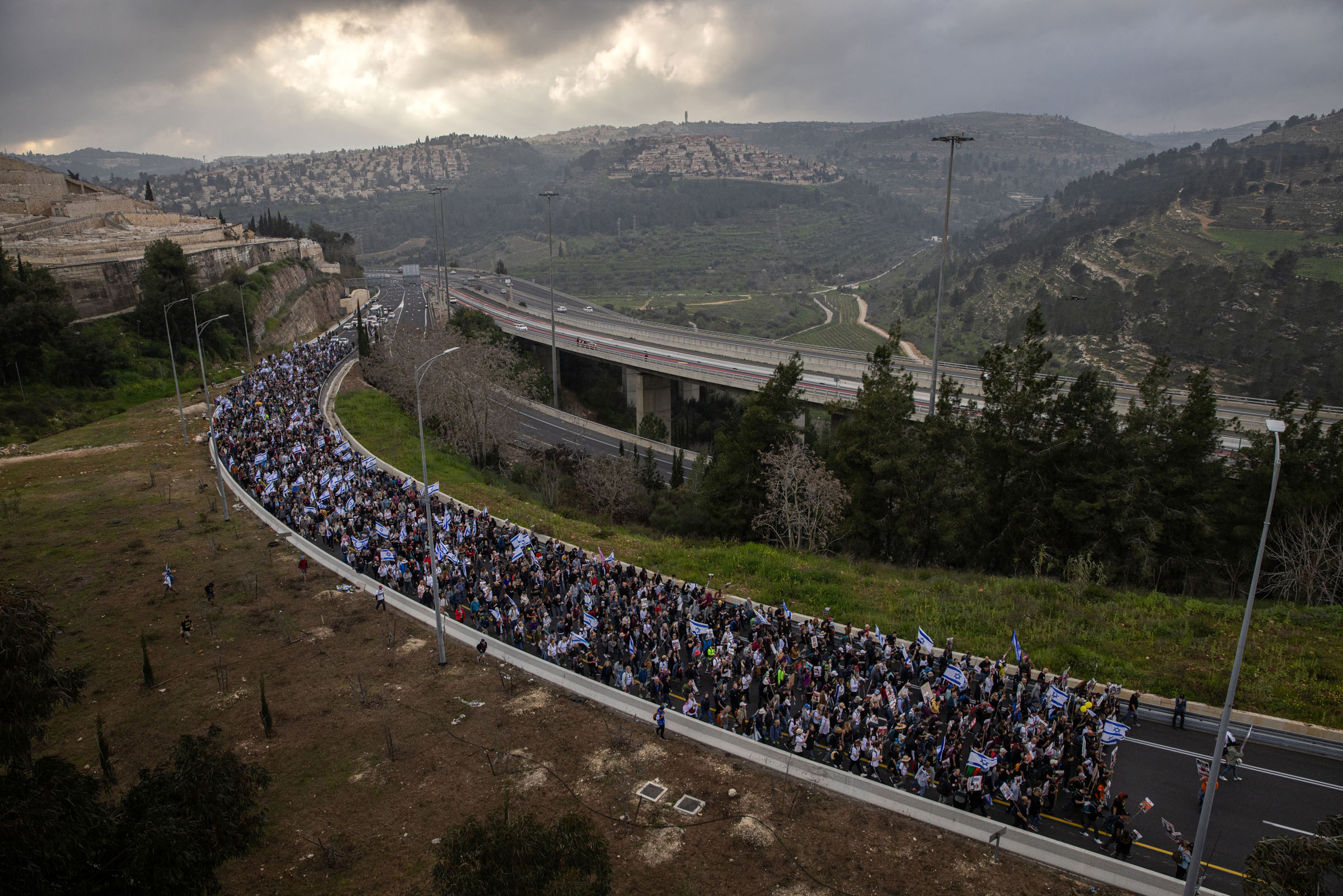 JERUSALEM, ISRAEL - MARCH 2, 2024 - Families of the hostages held in Gaza and supporters approach Jerusalem on the final day of a four-day march from areas attacked on October 7 in southern Israel to Jerusalem, on March 2, 2024. Amid fraught negotiations