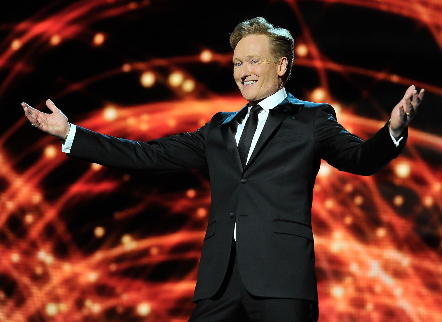 Conan O'Brien presents at the 2014 Breakthrough Prizes Awarded in Fundamental Physics and Life Sciences Ceremony at NASA Ames Research Center on December 12, 2013 in Mountain View, California.