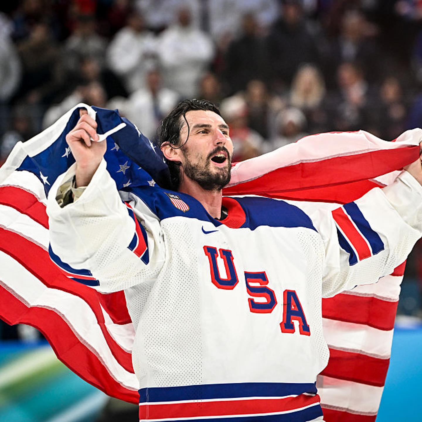 Goalkeeper Connor Hellebuyck of U.S. celebrates winning the gold medal during the Ice Hockey Men's Gold Medal Game match between Canada and USA on day sixteen of the Milano Cortina 2026 Winter Olympic games at Milano Santagiulia Ice Hockey Arena in Milan, Italy on Feb. 22, 2026.