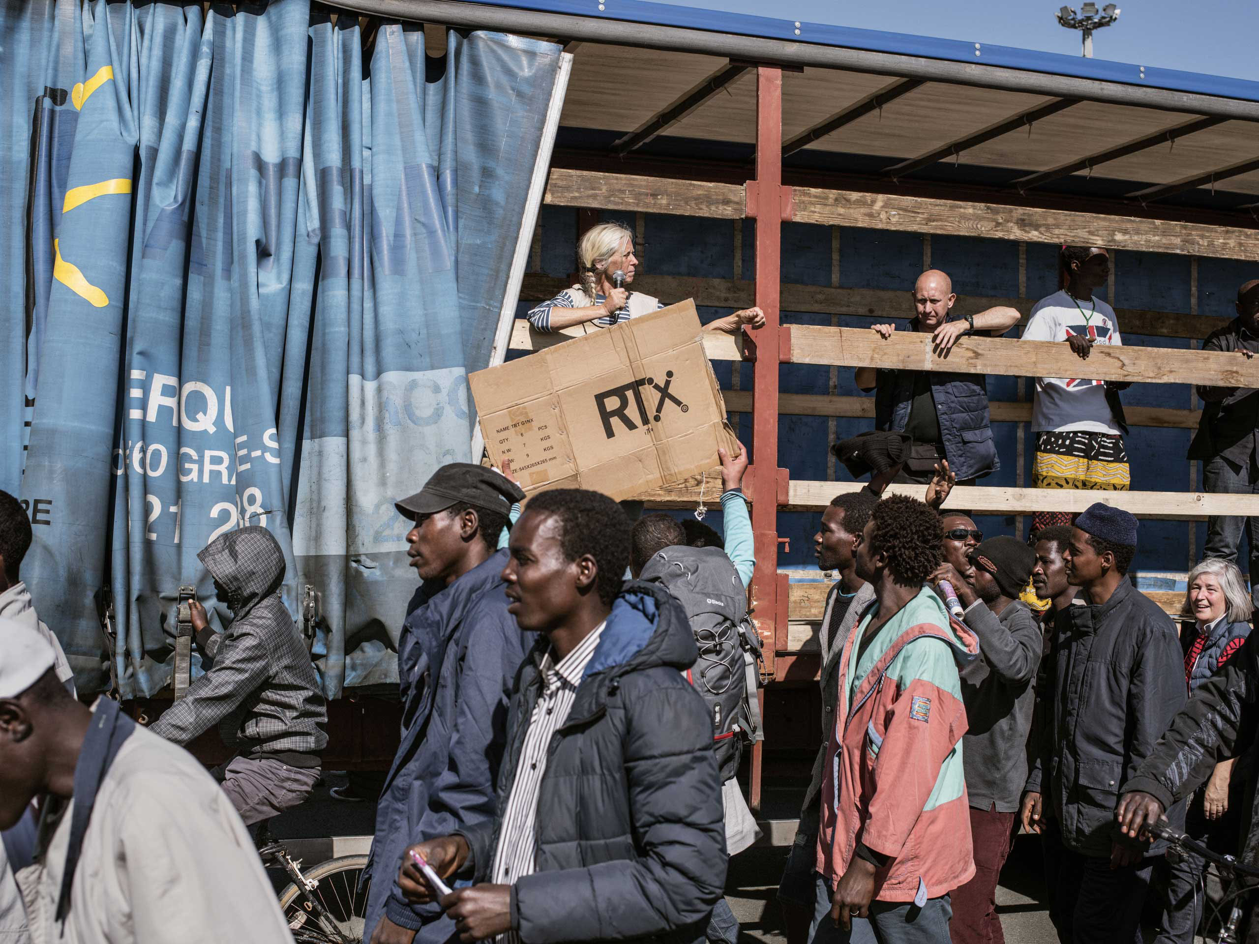 Activists support migrants during a demonstration in Calais, France, Sept. 17, 2015.