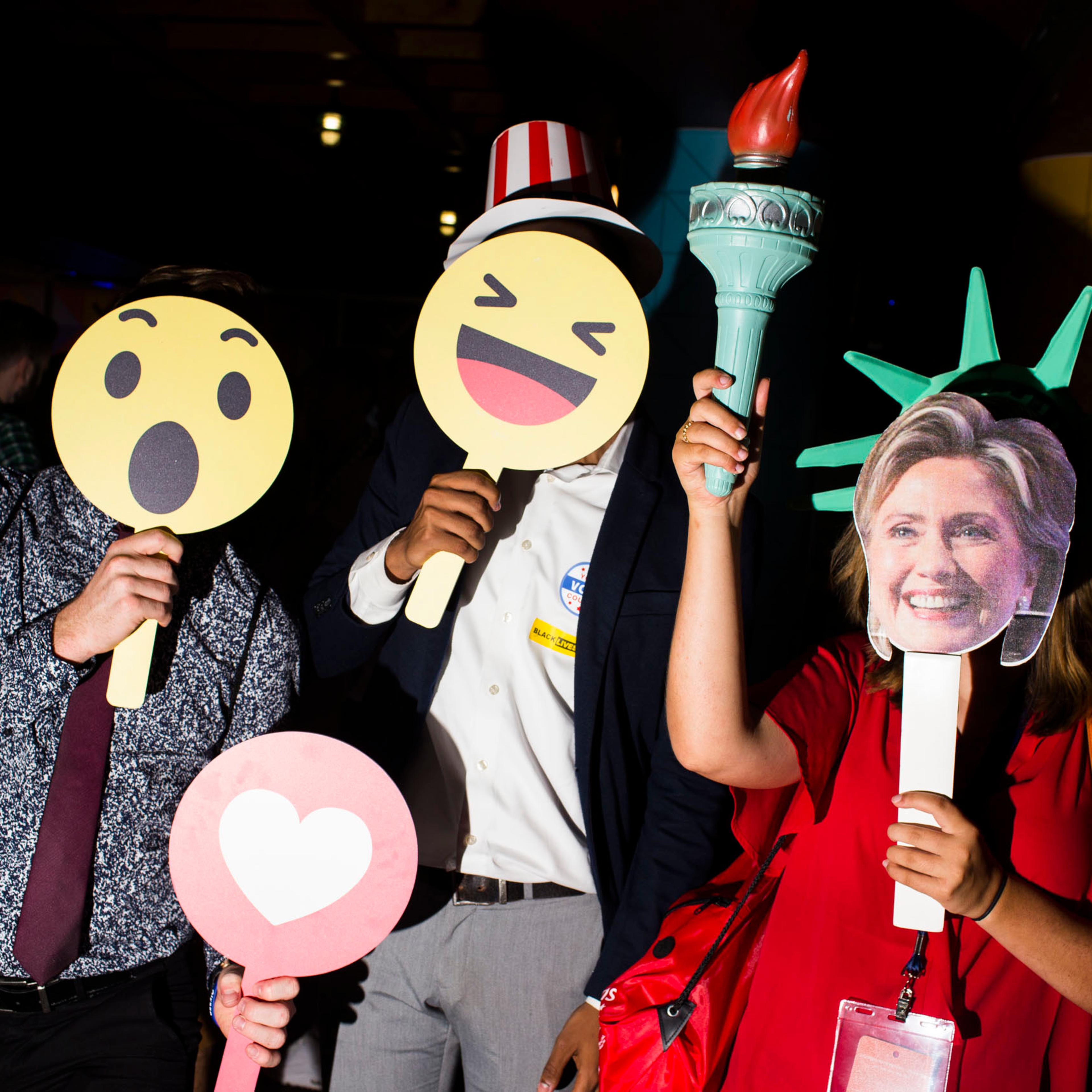 Members of College Democrats of America pose for pictures in the Instagram/ Facebook lounge at the 2016 Democratic National Convention in Philadelphia on Monday, July 25, 2016.
