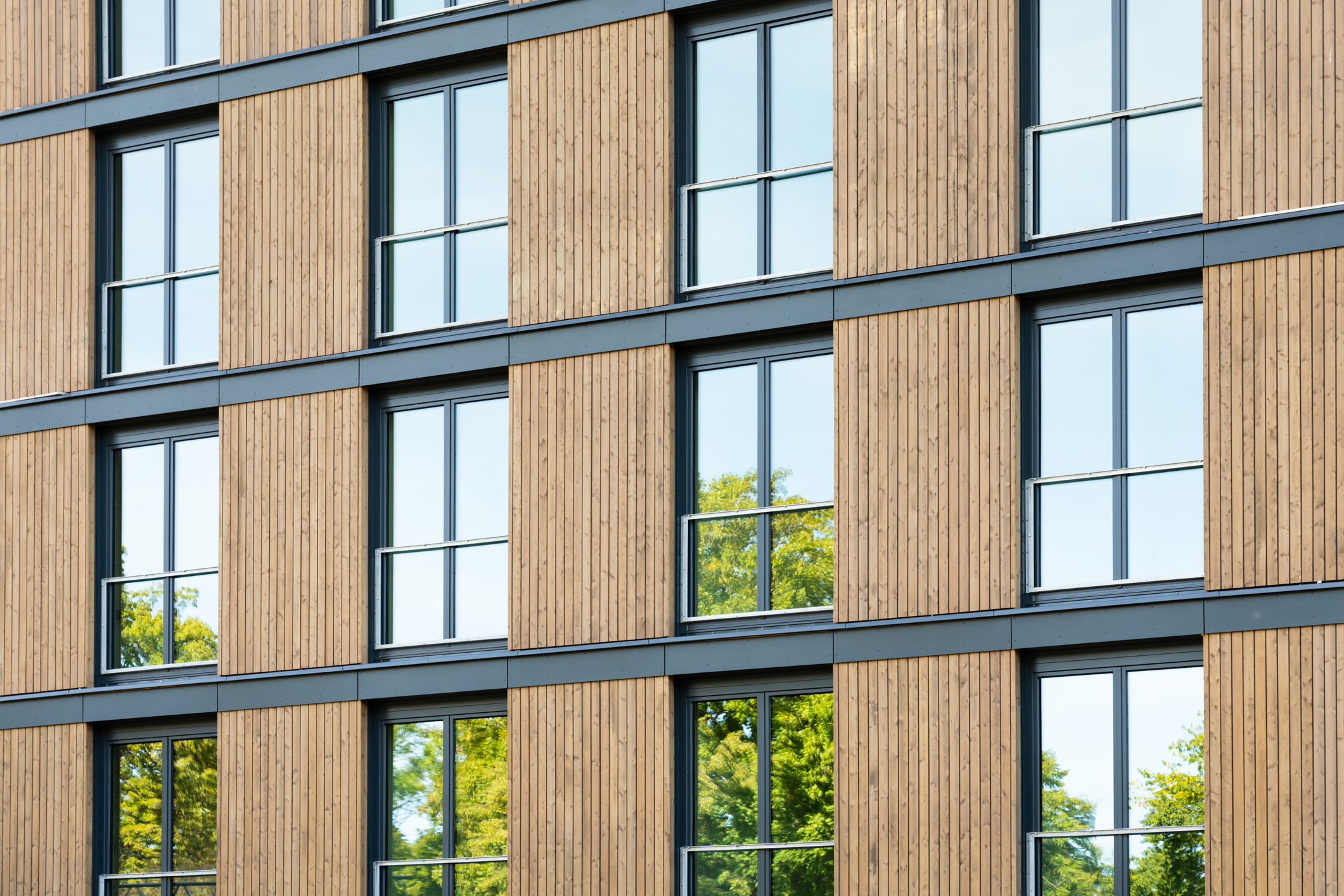 Apartment building with a wood facade.