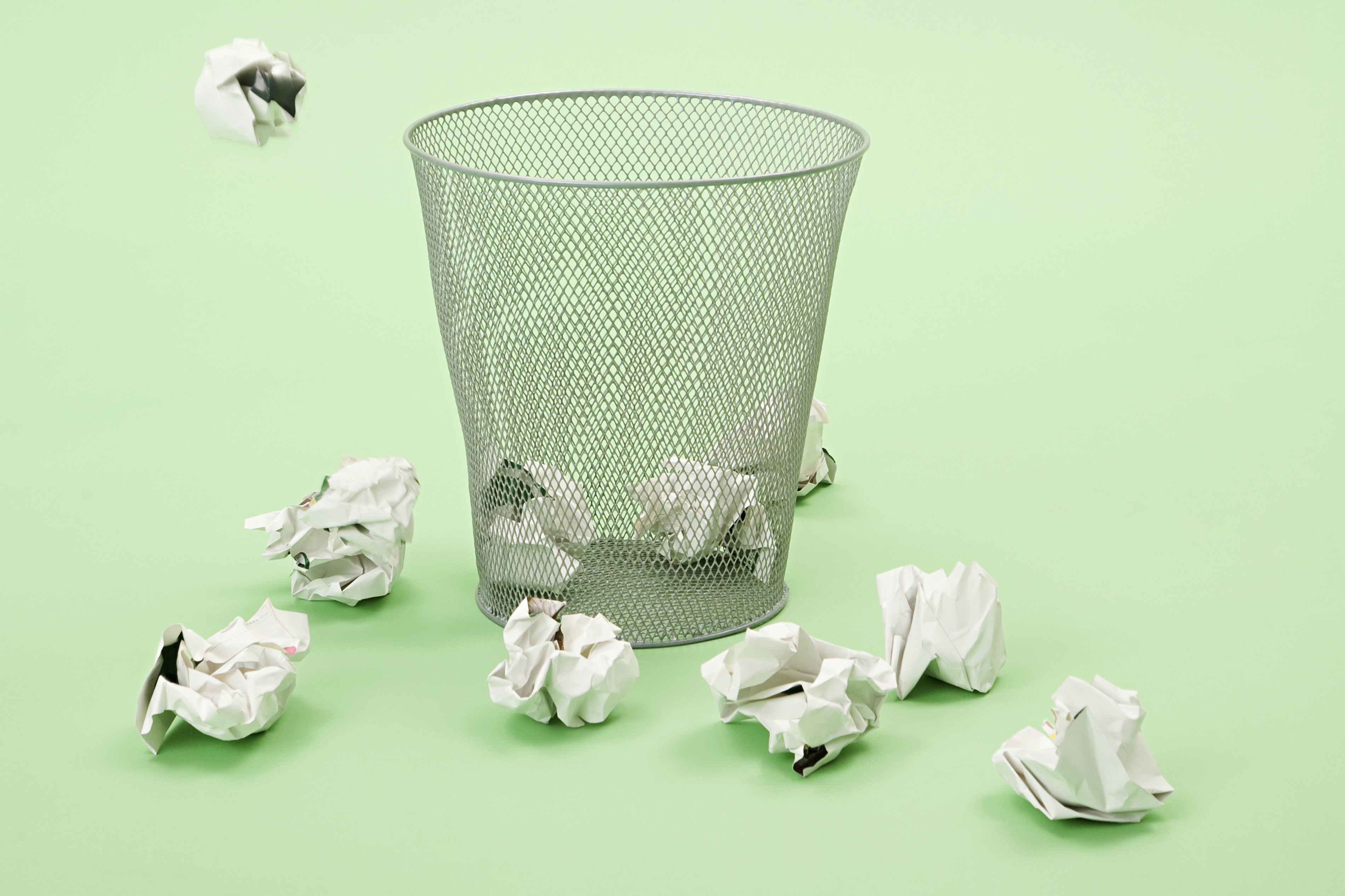 Paper getting thrown into a bin