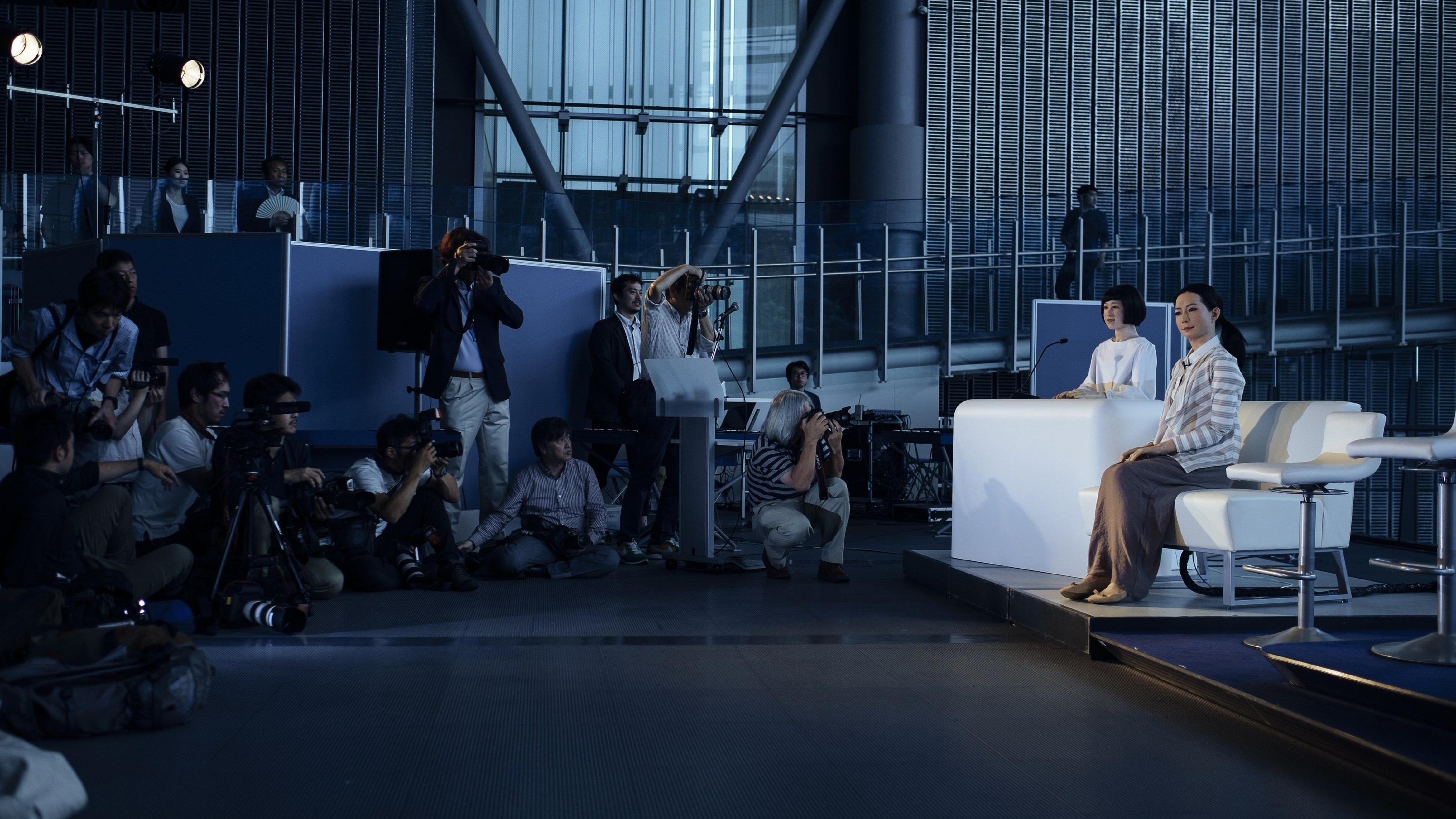 The new humanoid robots named "Otonaroid" and "Kodomoroid" are pictured during a press preview at the National Museum of Emerging Science and Technology in Tokyo on June 24, 2014.