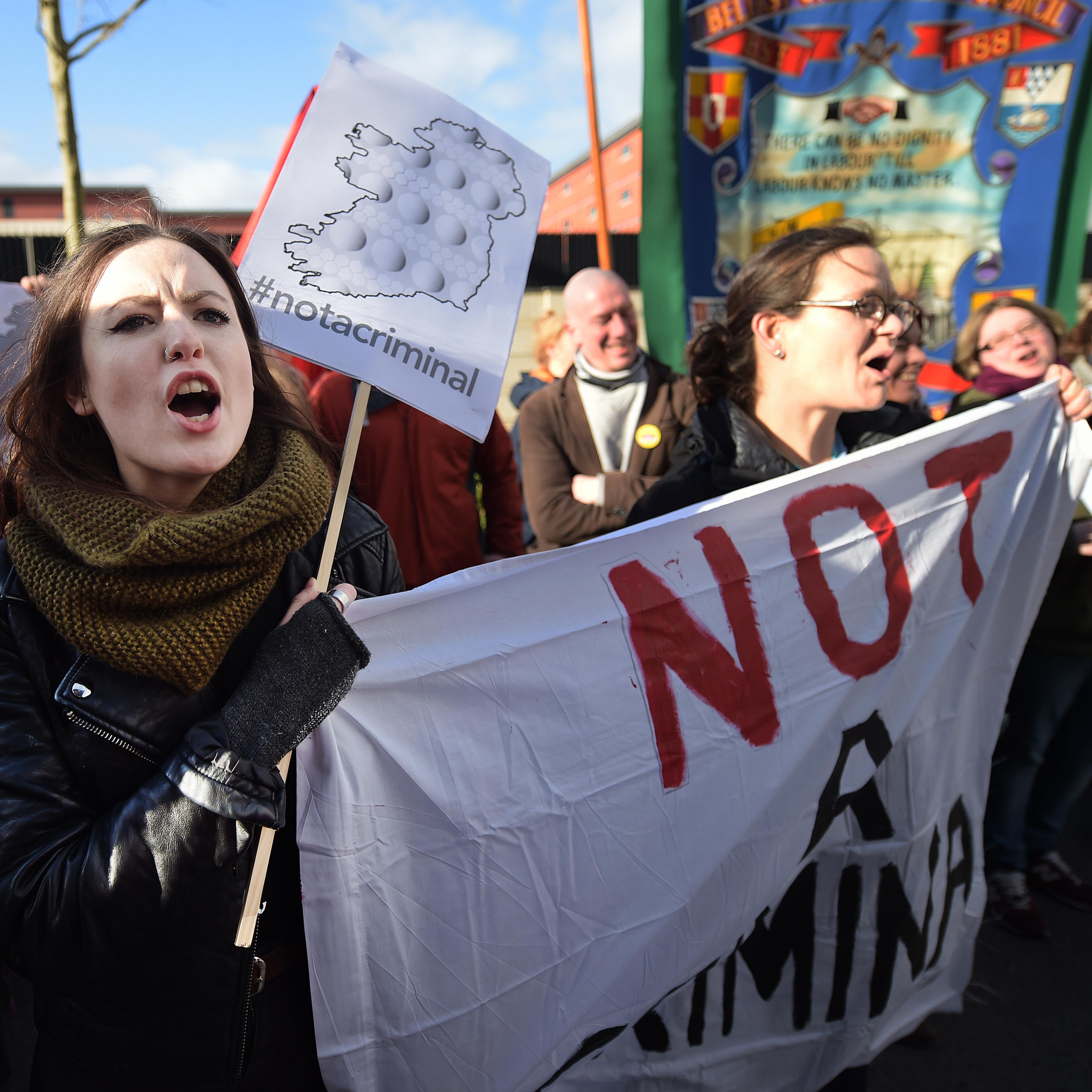Pro choice supporters protest outside the Public Prosecution Office on April 7, 2016 in Belfast, Northern Ireland.