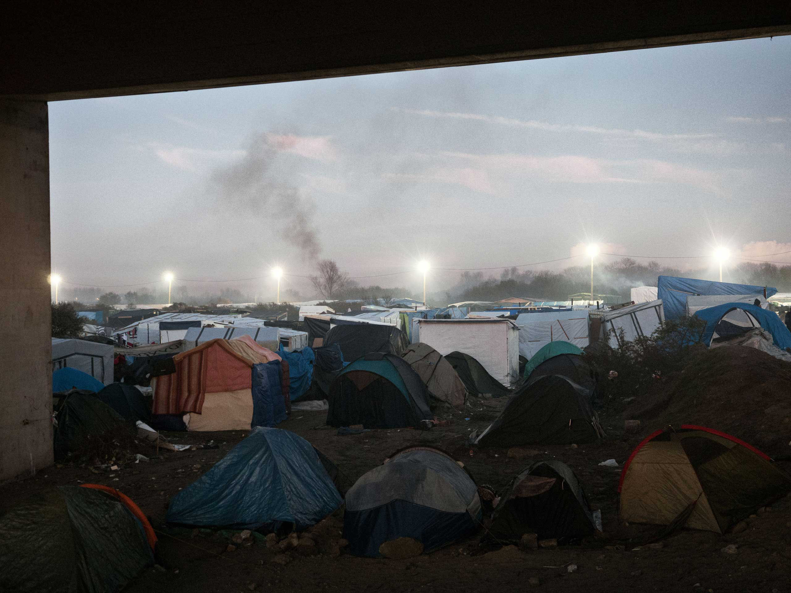 The tents that make the shantytown known as the ÒjungleÓ of Calais, France, where a mix of refugees, asylum seekers and economic migrants from Darfur, Afghanistan, Syria, Iraq, Eritrea live before they attempt to enter the United Kingdom by stowing away 