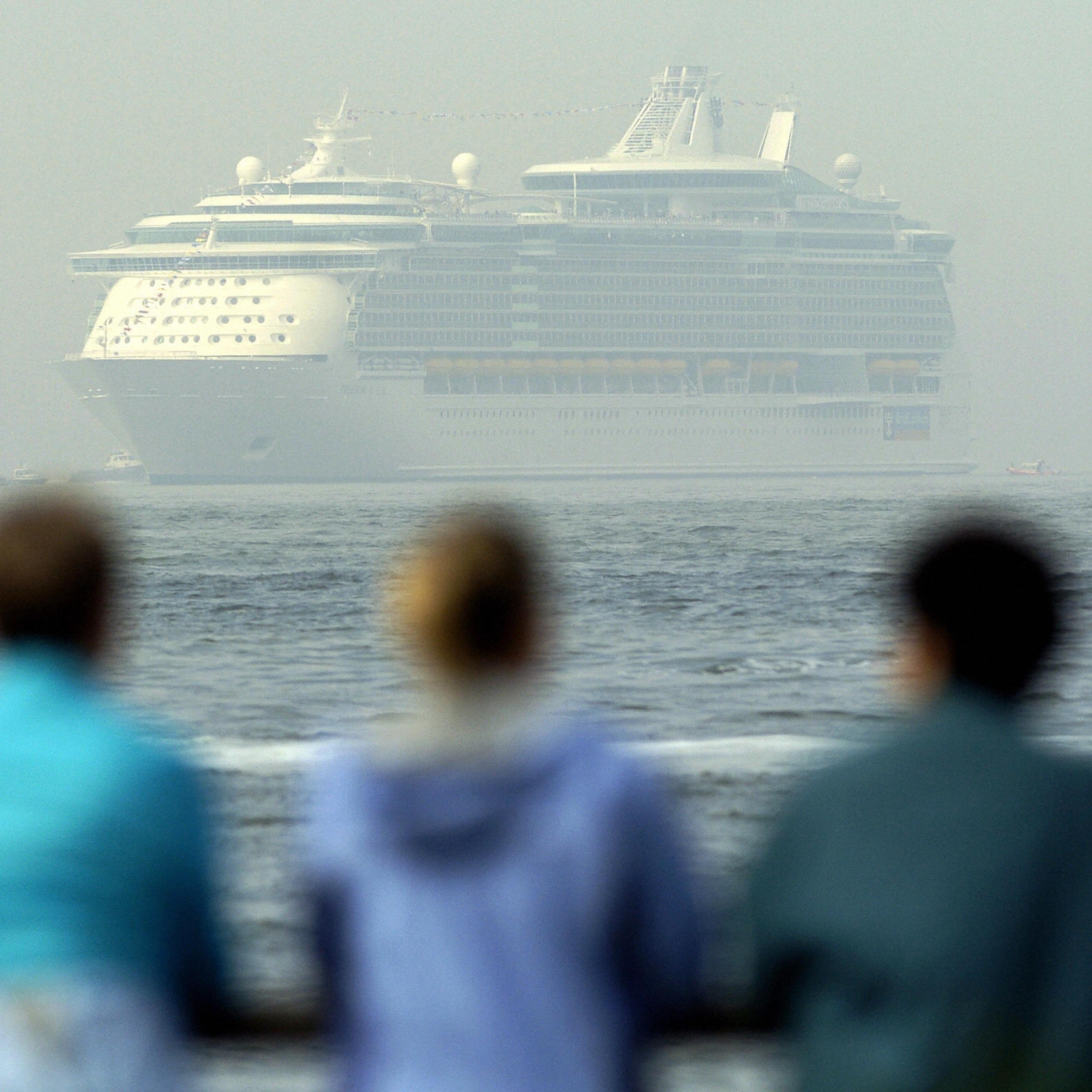 People watch Freedom of the Seas, the wo
