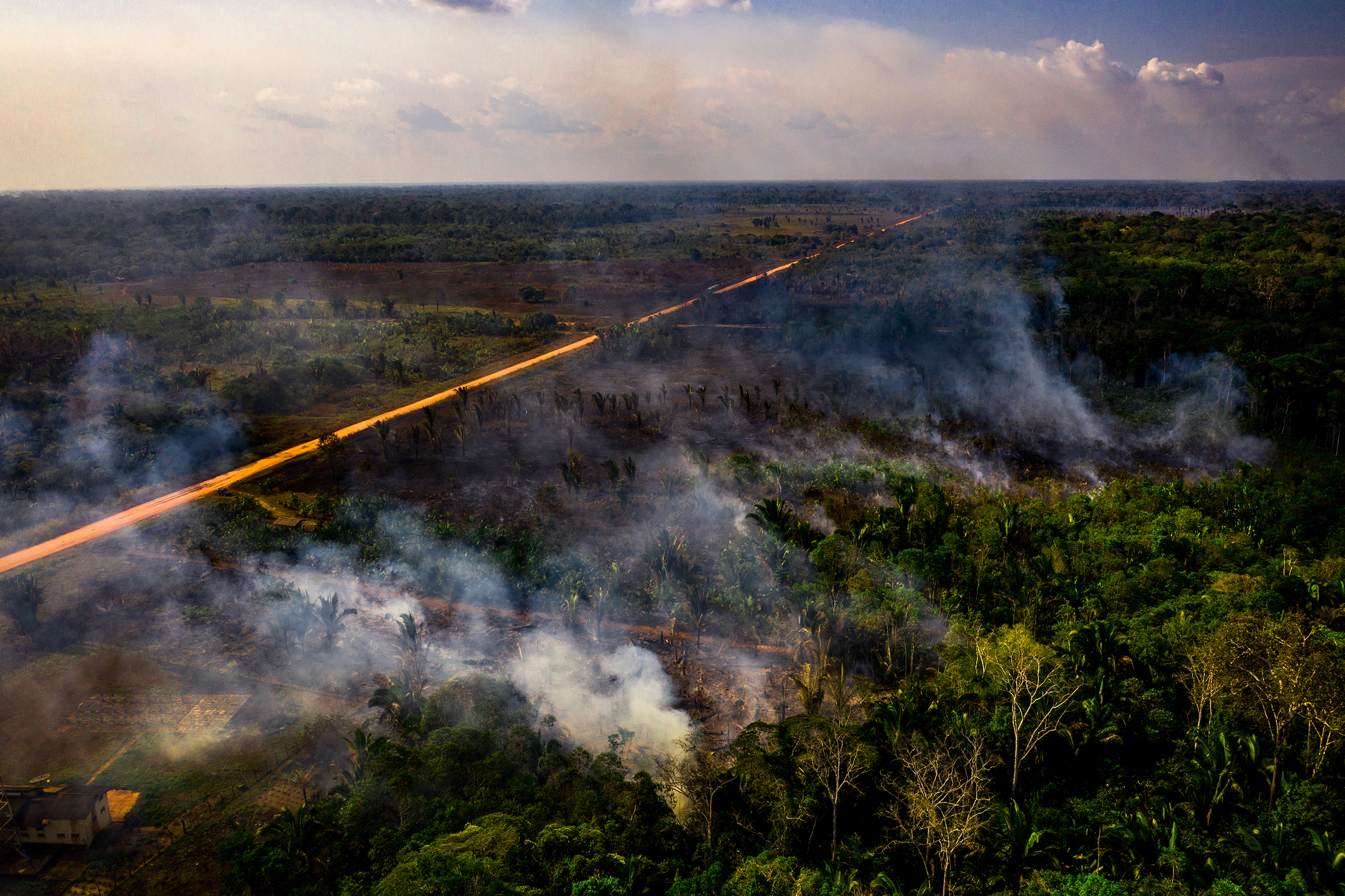Smoke rises from fires in a section of the rain forest near Realidade, Brazil, on Aug. 26.