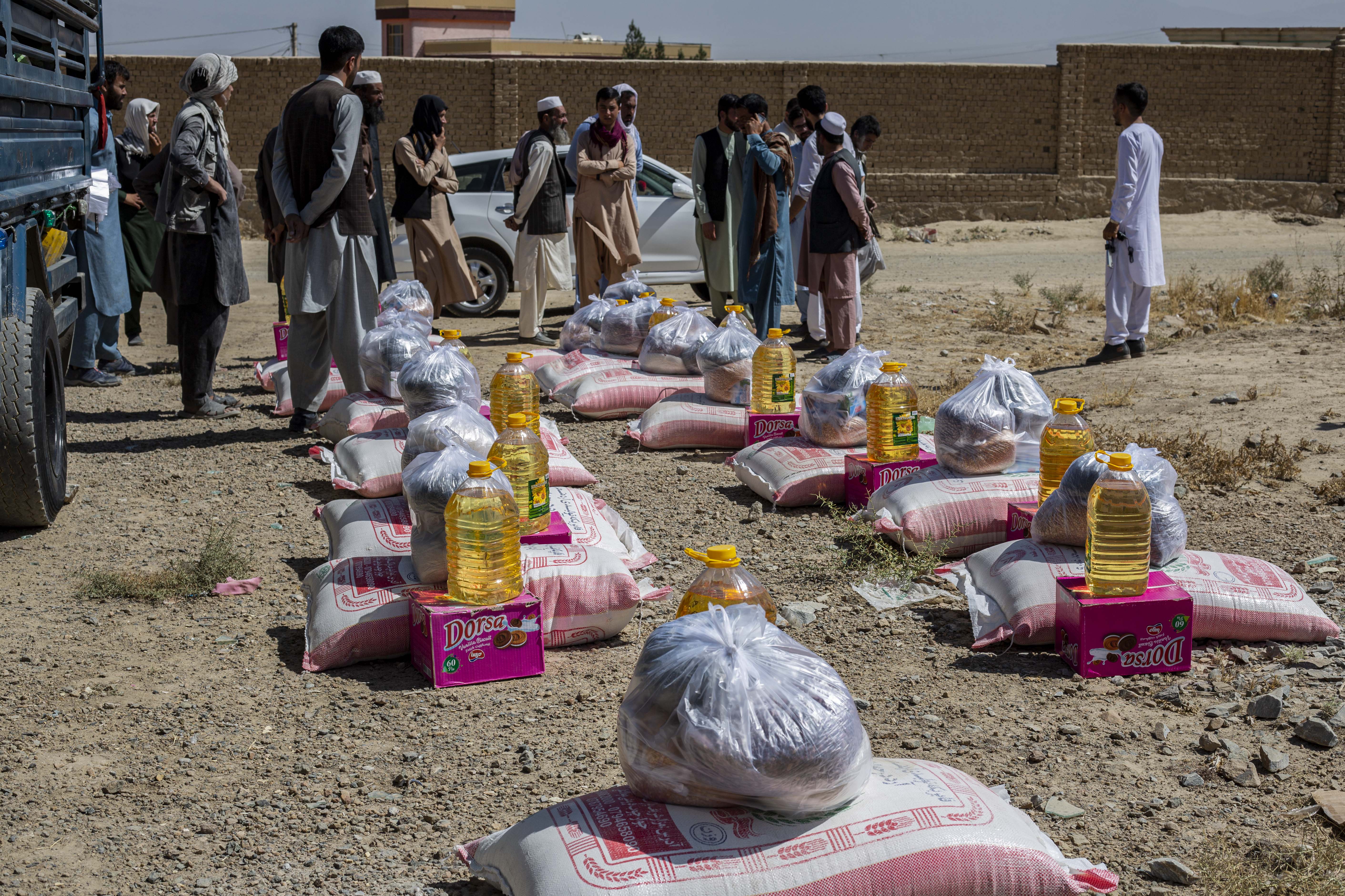 Aseel workers convene at Logar province, Afghanistan, for the distribution of food and medicines on Oct. 2, 2021