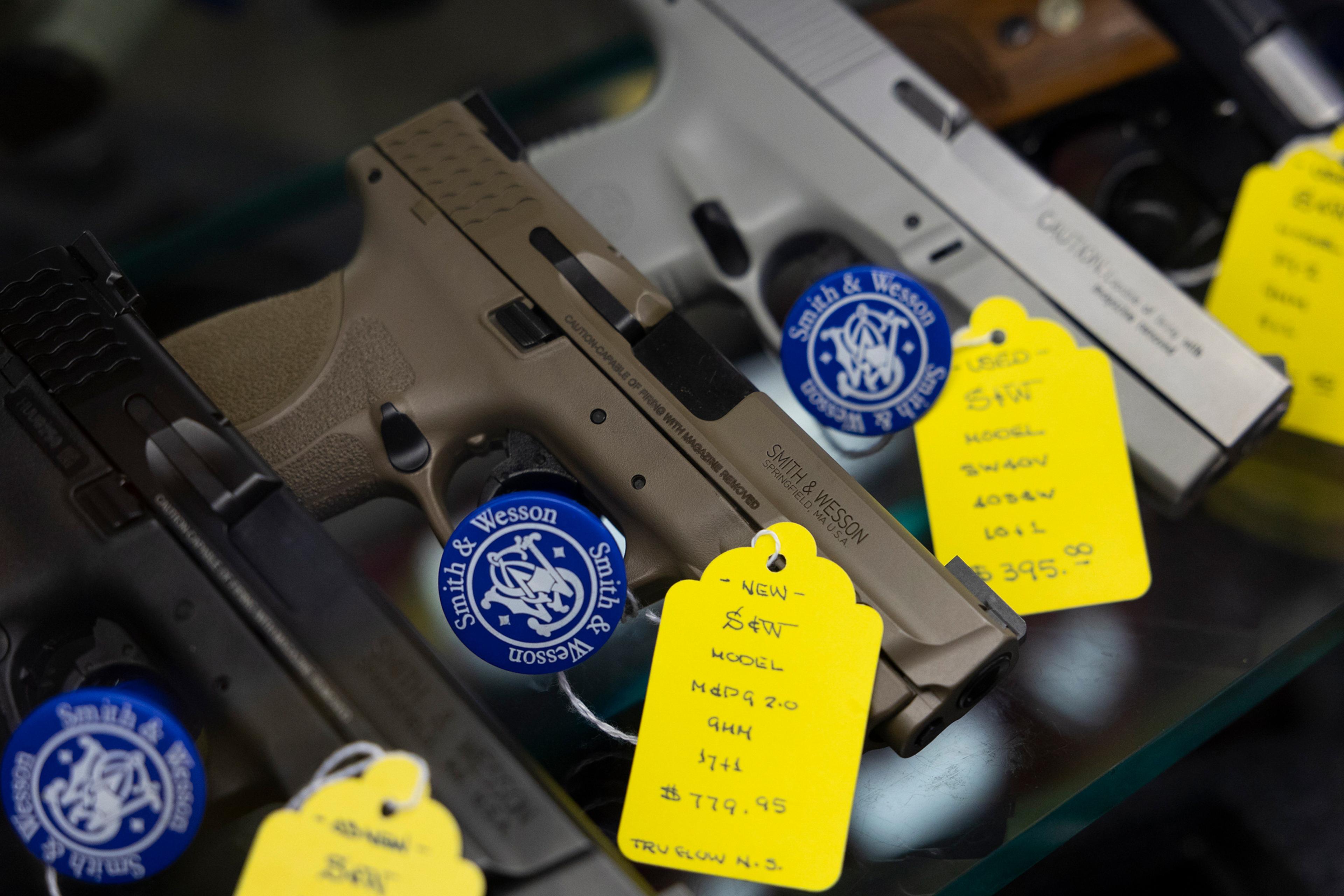 Handguns for sale at Lock's Philadelphia Gun Exchange in Philadelphia, April 2022.