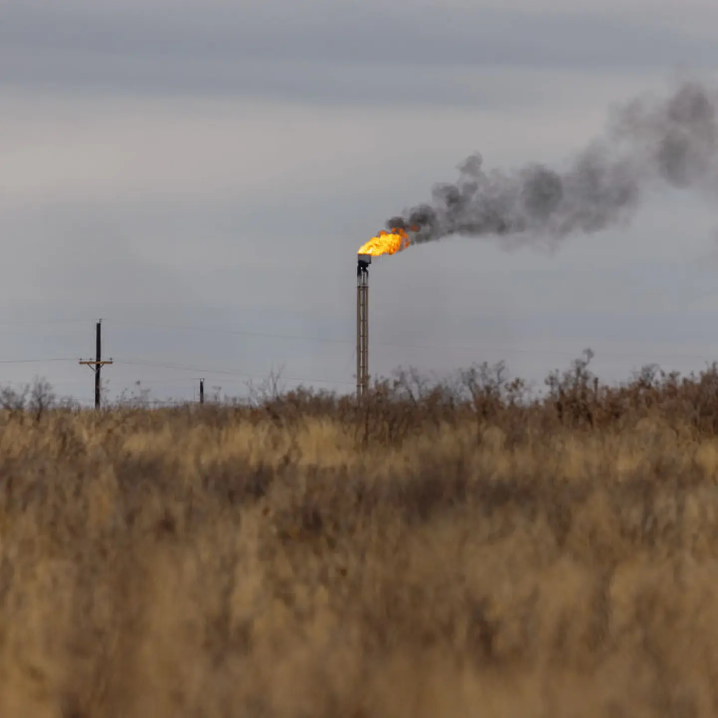 A natural gas flare stack at an oil well in Midland, Texas, U.S. on April 4, 2022.