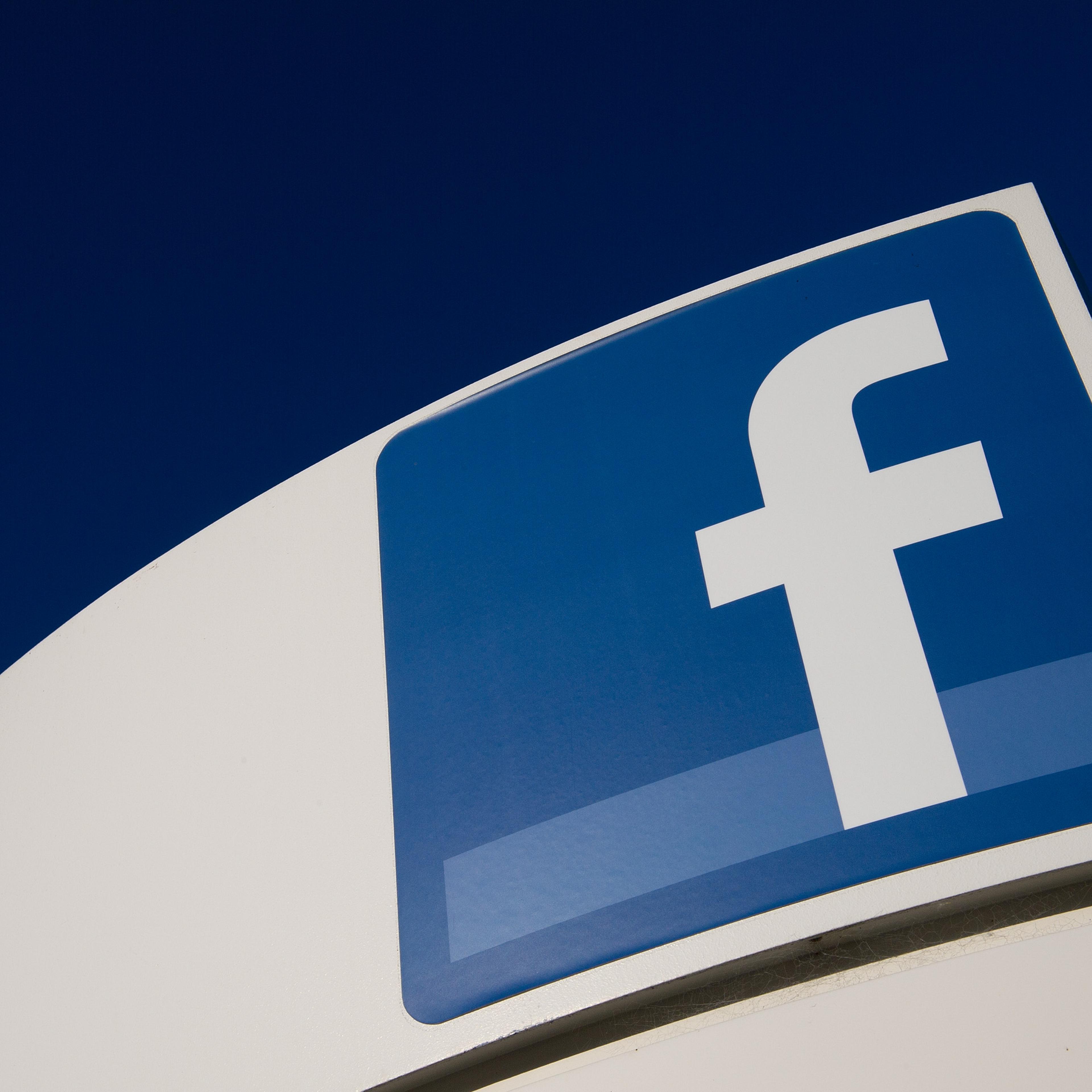 Facebook Inc. signage is displayed outside the company's new campus in Menlo Park, California, U.S., on Friday, Dec. 2, 2011.